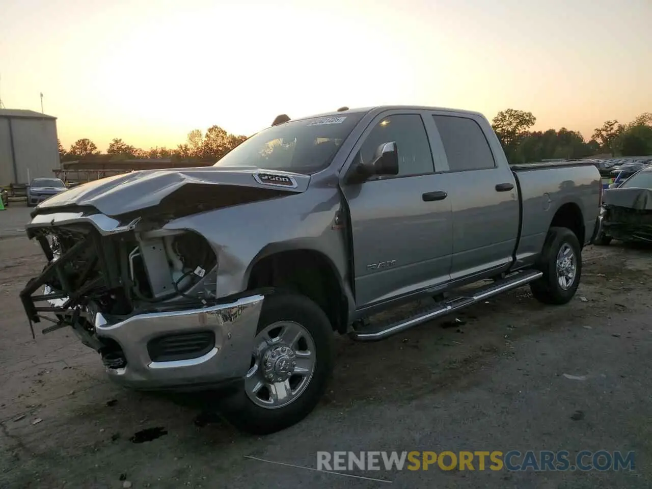 1 Photograph of a damaged car 3C6UR5CL4MG631756 RAM 2500 2021