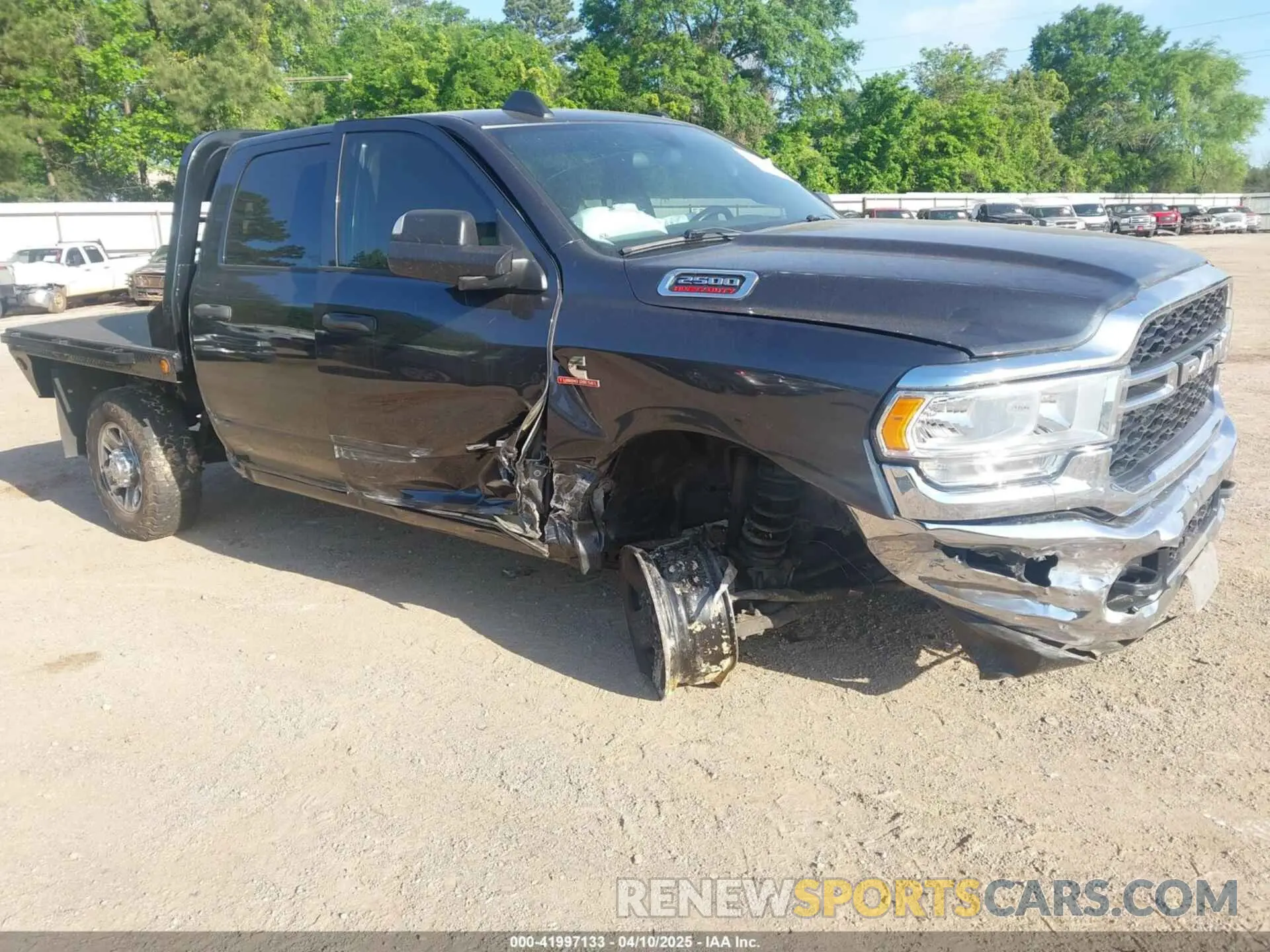1 Photograph of a damaged car 3C6UR5CL4MG655572 RAM 2500 2021