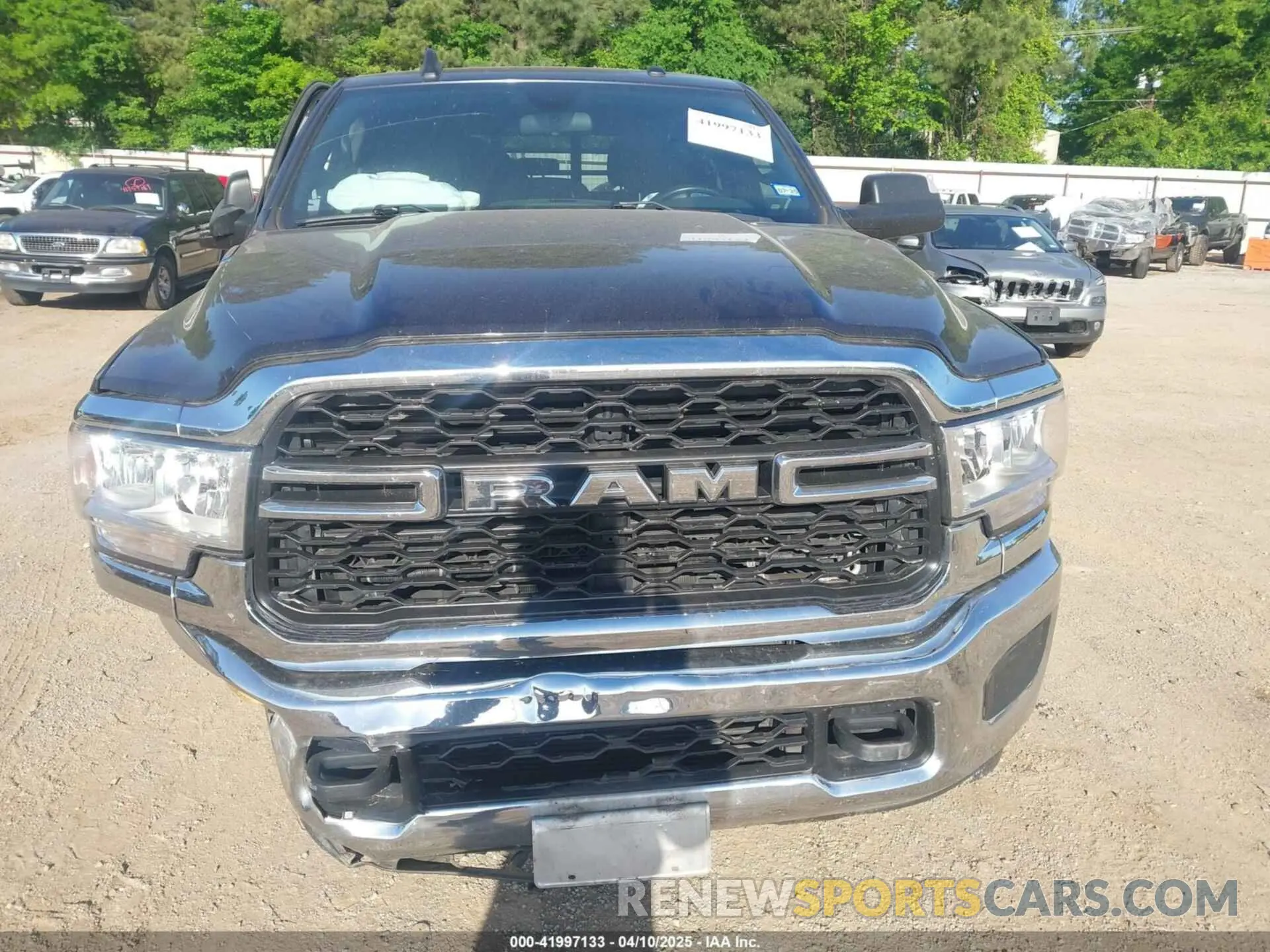 11 Photograph of a damaged car 3C6UR5CL4MG655572 RAM 2500 2021