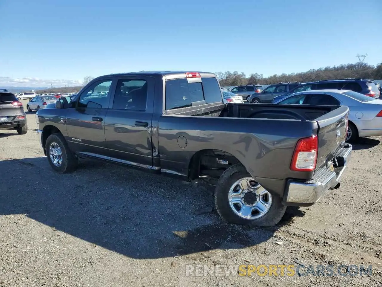 2 Photograph of a damaged car 3C6UR5CL4MG675319 RAM 2500 2021