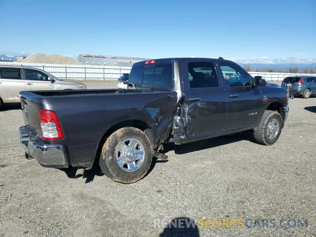 3 Photograph of a damaged car 3C6UR5CL4MG675319 RAM 2500 2021