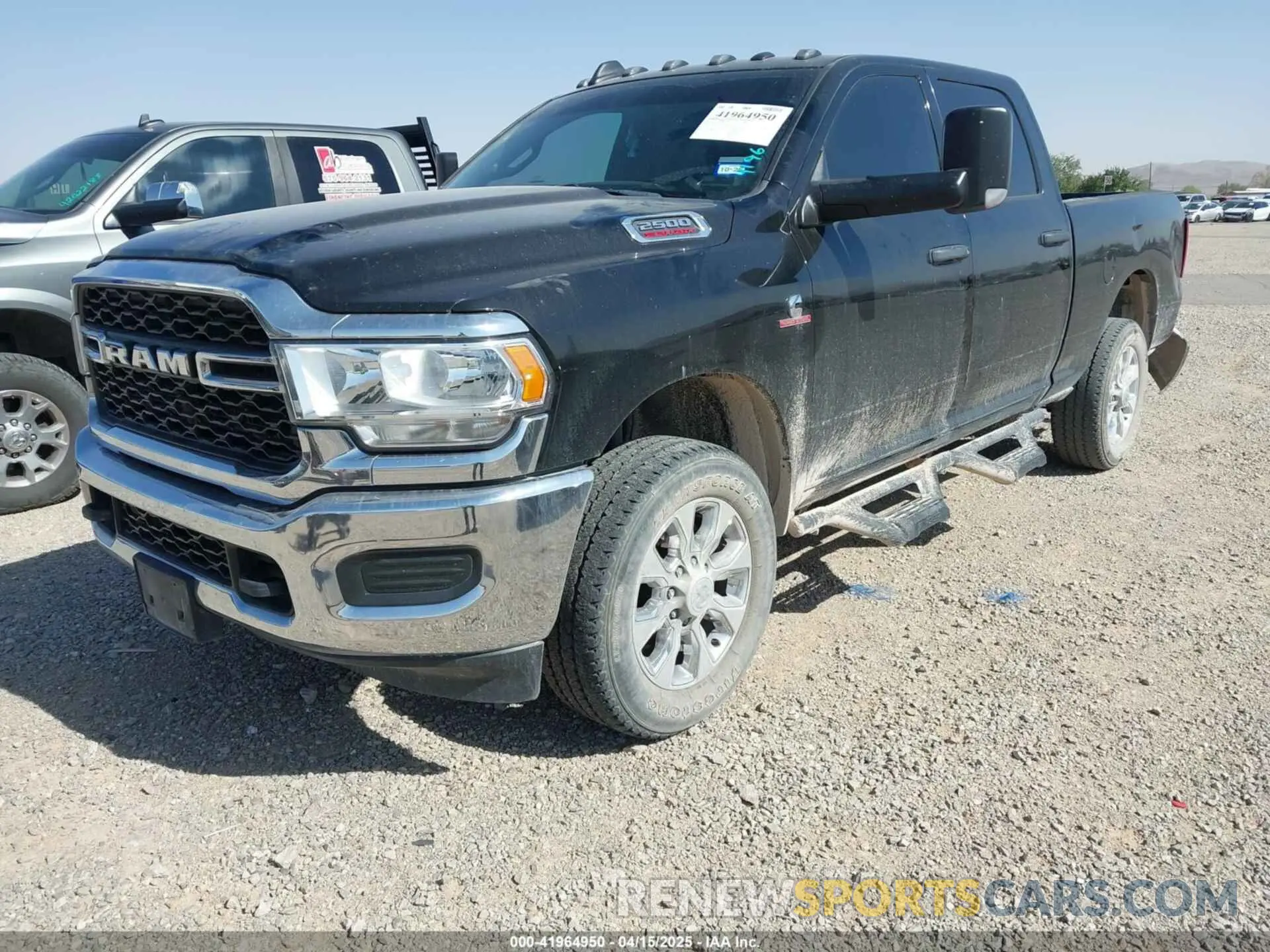 2 Photograph of a damaged car 3C6UR5CL4MG675658 RAM 2500 2021