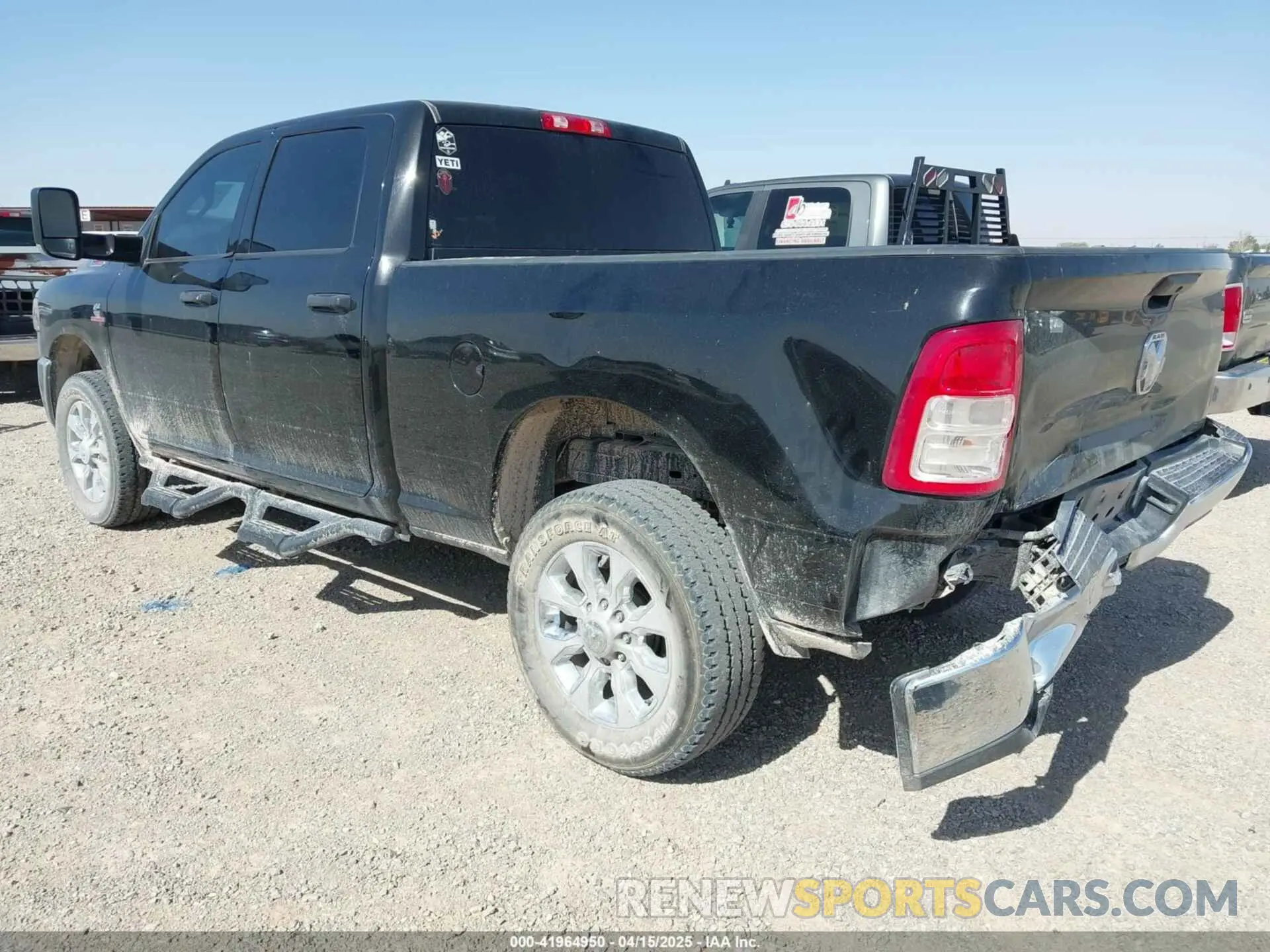 3 Photograph of a damaged car 3C6UR5CL4MG675658 RAM 2500 2021