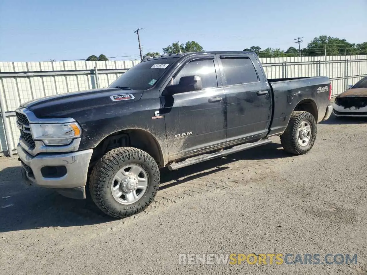 1 Photograph of a damaged car 3C6UR5CL7MG557622 RAM 2500 2021