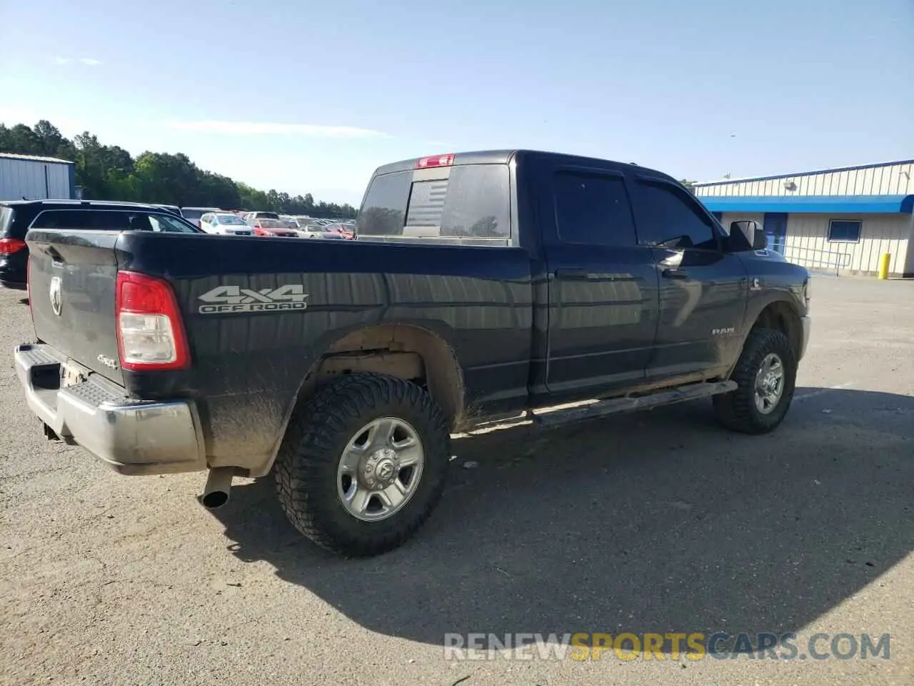 3 Photograph of a damaged car 3C6UR5CL7MG557622 RAM 2500 2021