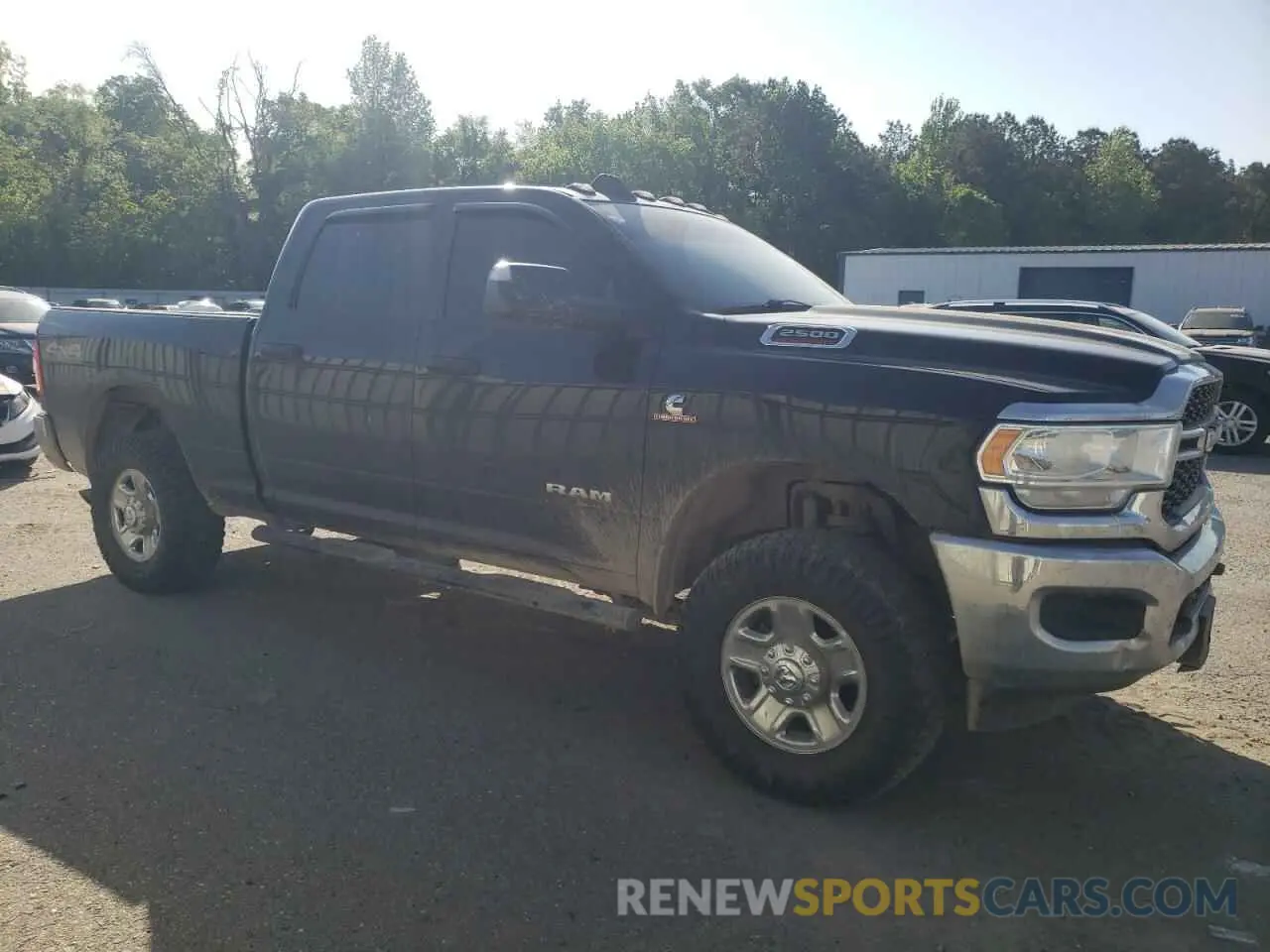 4 Photograph of a damaged car 3C6UR5CL7MG557622 RAM 2500 2021