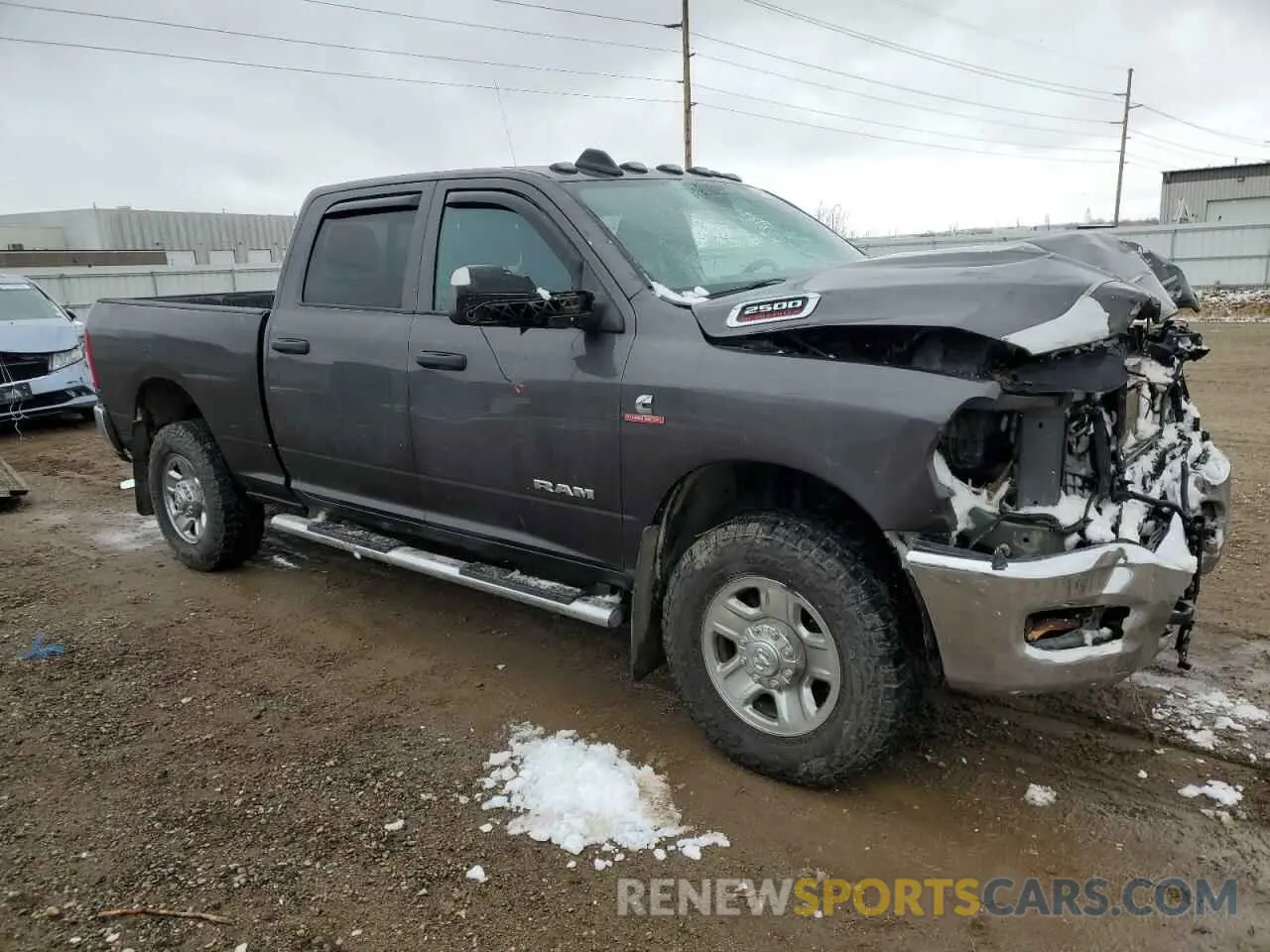 4 Photograph of a damaged car 3C6UR5CL8MG538609 RAM 2500 2021