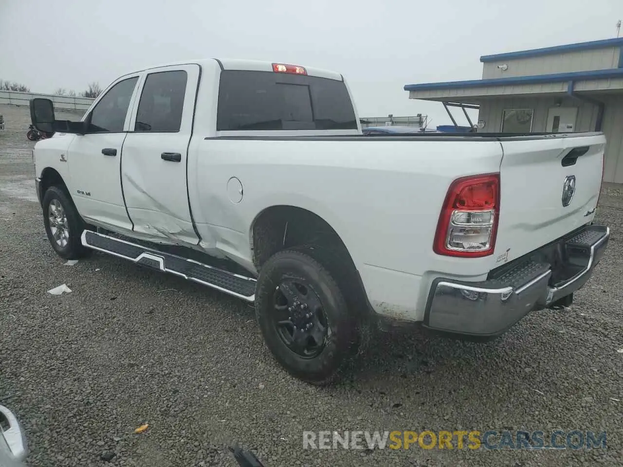 2 Photograph of a damaged car 3C6UR5CL9MG681939 RAM 2500 2021