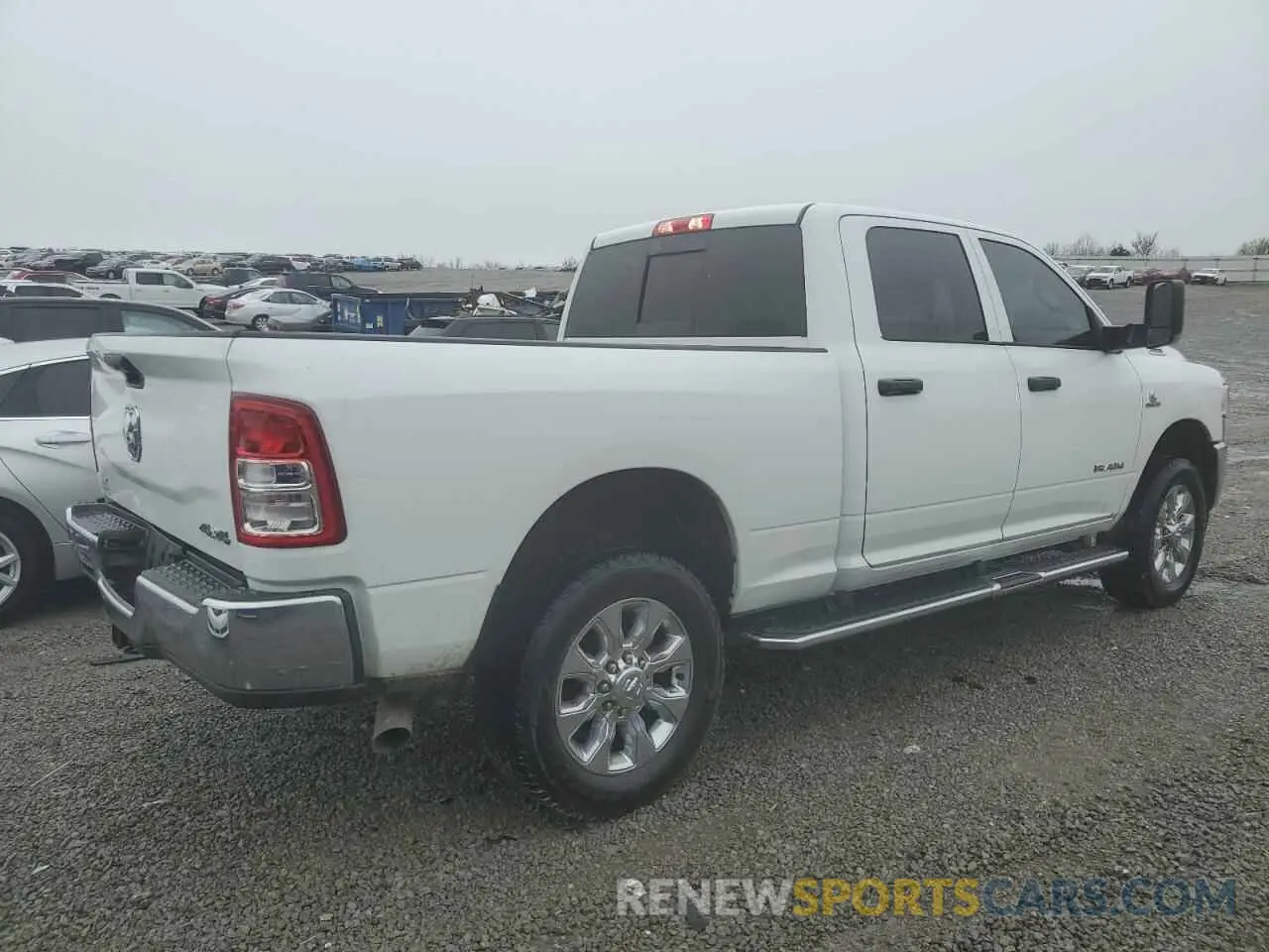 3 Photograph of a damaged car 3C6UR5CL9MG681939 RAM 2500 2021