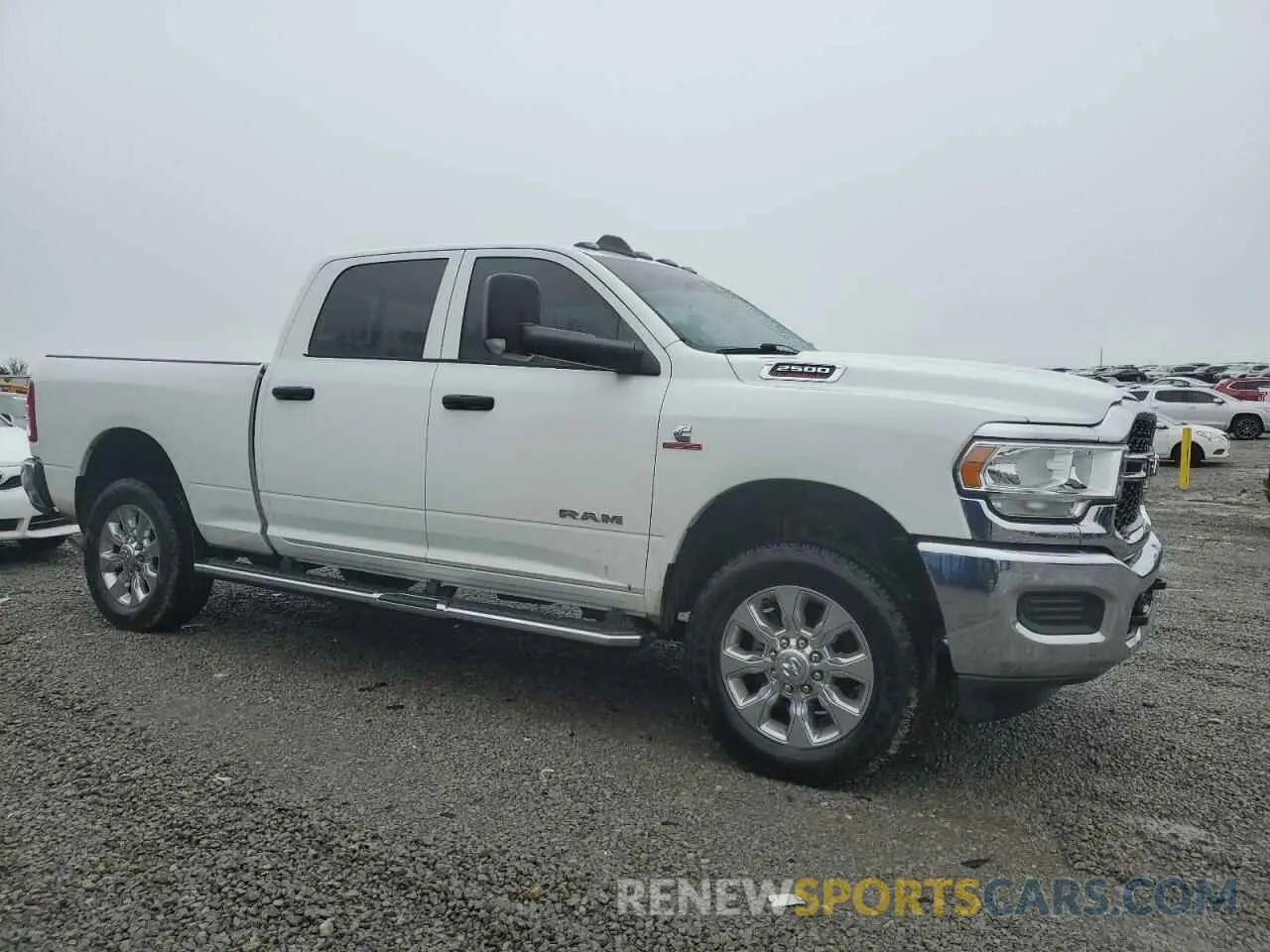 4 Photograph of a damaged car 3C6UR5CL9MG681939 RAM 2500 2021