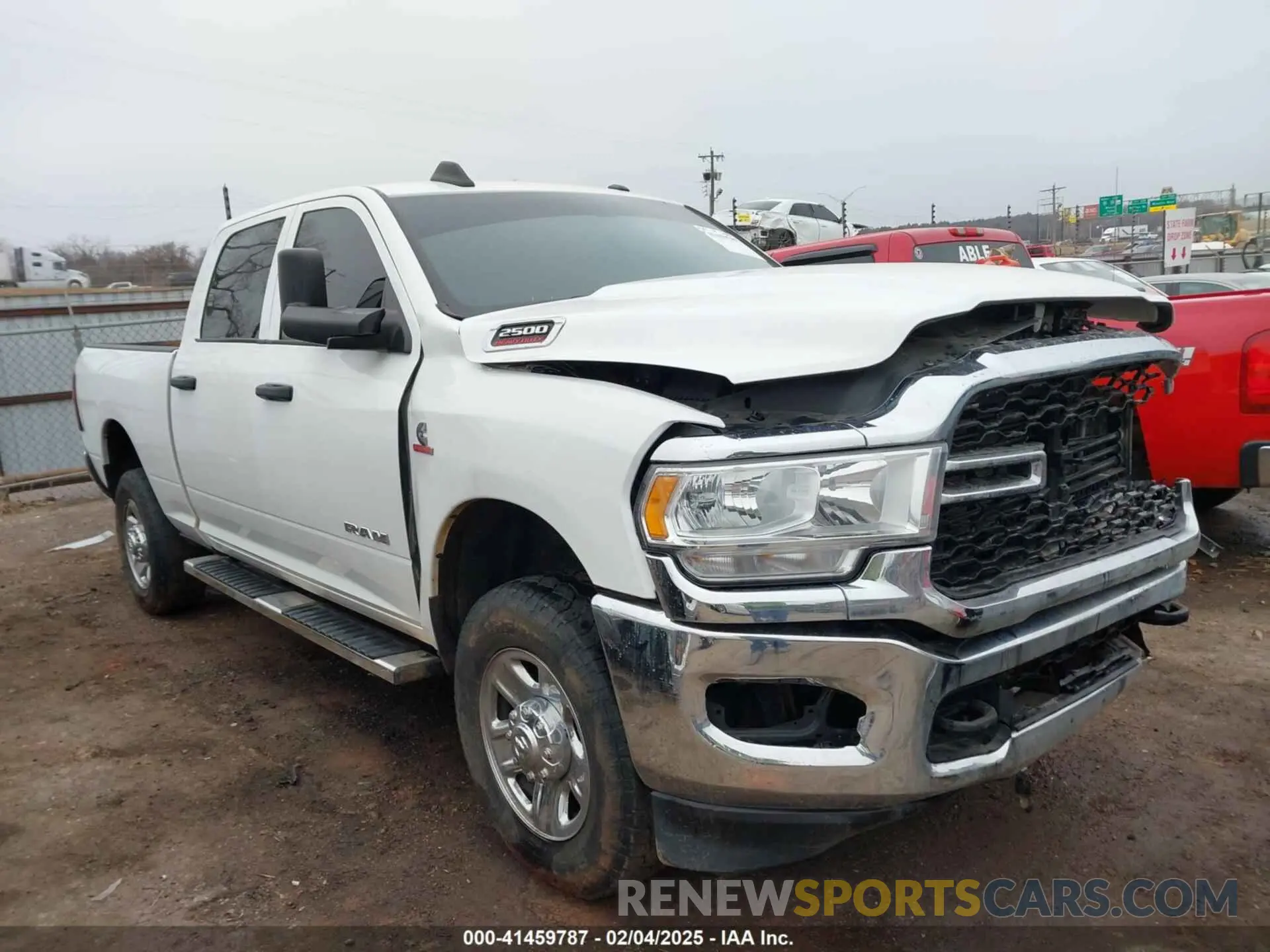 1 Photograph of a damaged car 3C6UR5CLXMG632197 RAM 2500 2021