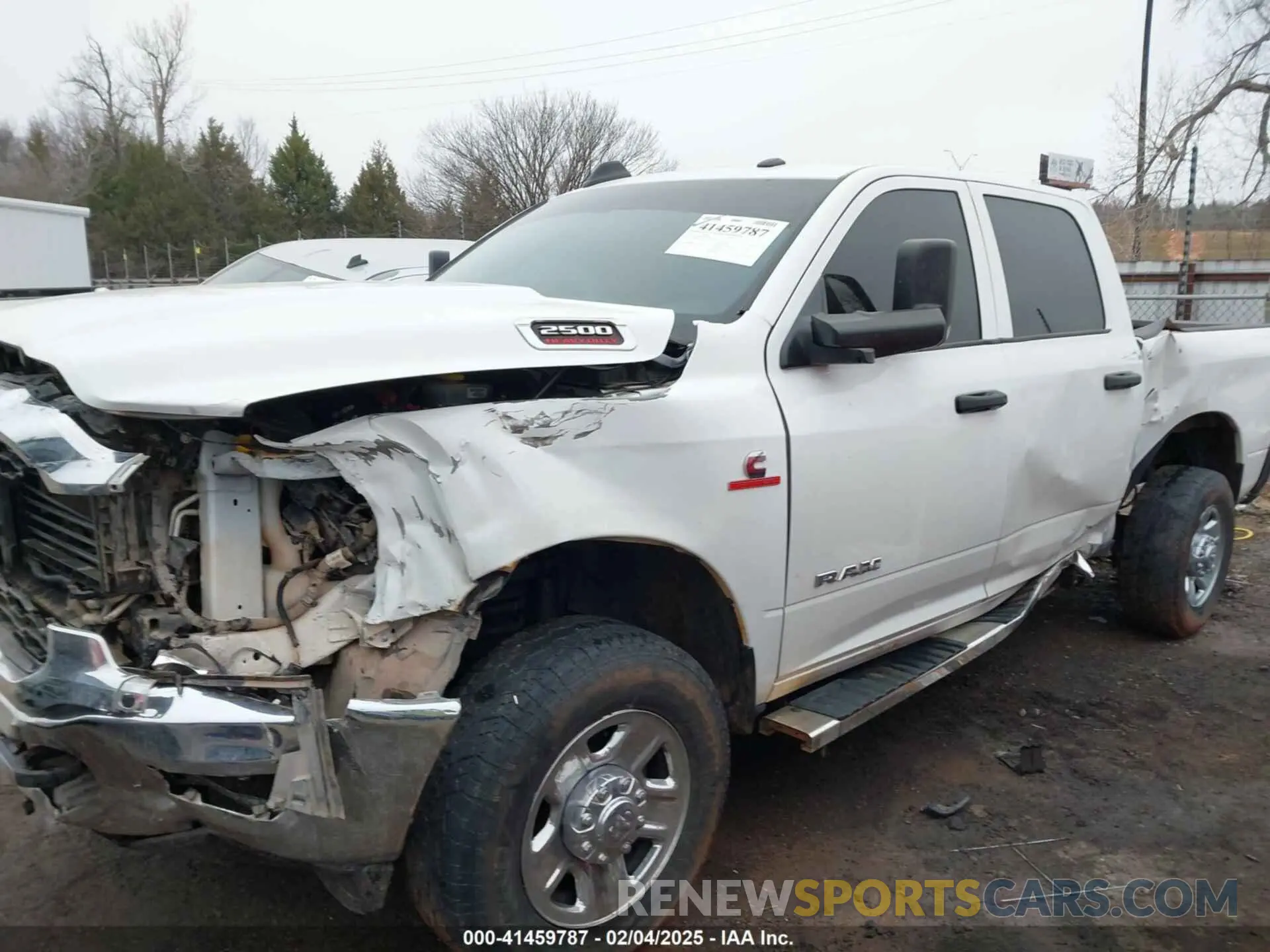 14 Photograph of a damaged car 3C6UR5CLXMG632197 RAM 2500 2021