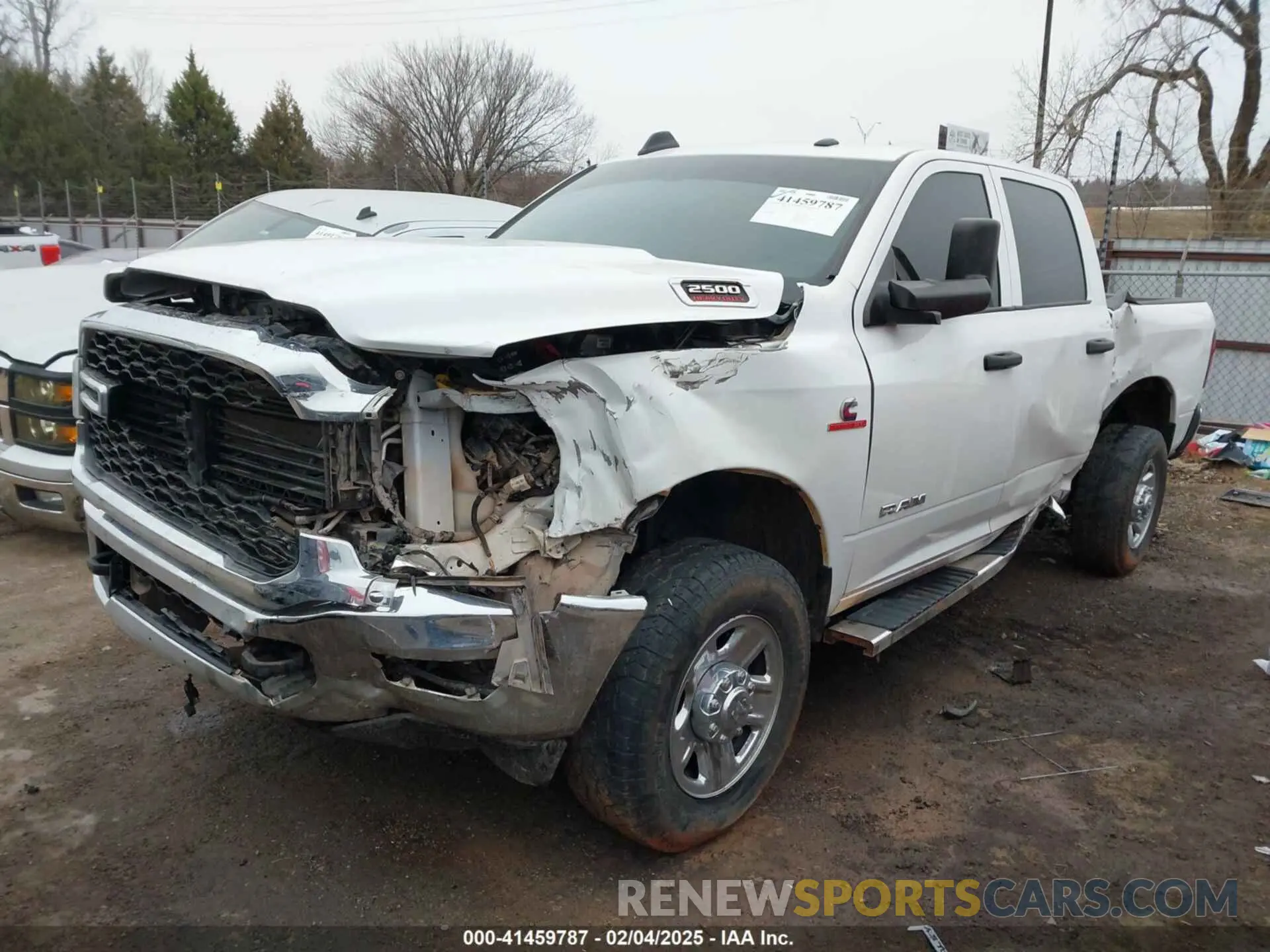 2 Photograph of a damaged car 3C6UR5CLXMG632197 RAM 2500 2021