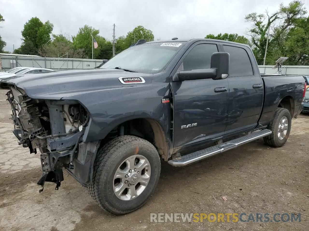 1 Photograph of a damaged car 3C6UR5DJ1MG625586 RAM 2500 2021