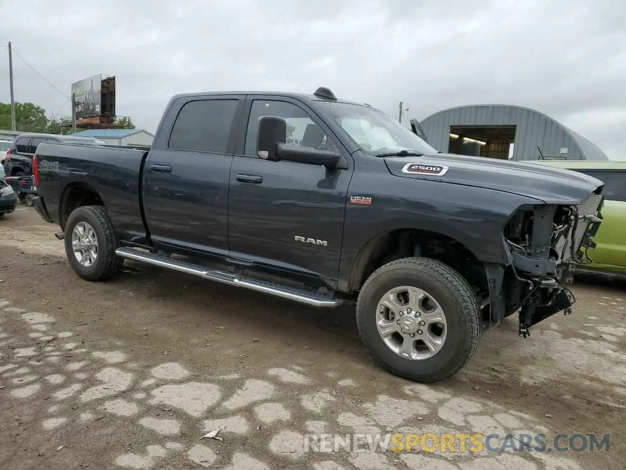 4 Photograph of a damaged car 3C6UR5DJ1MG625586 RAM 2500 2021