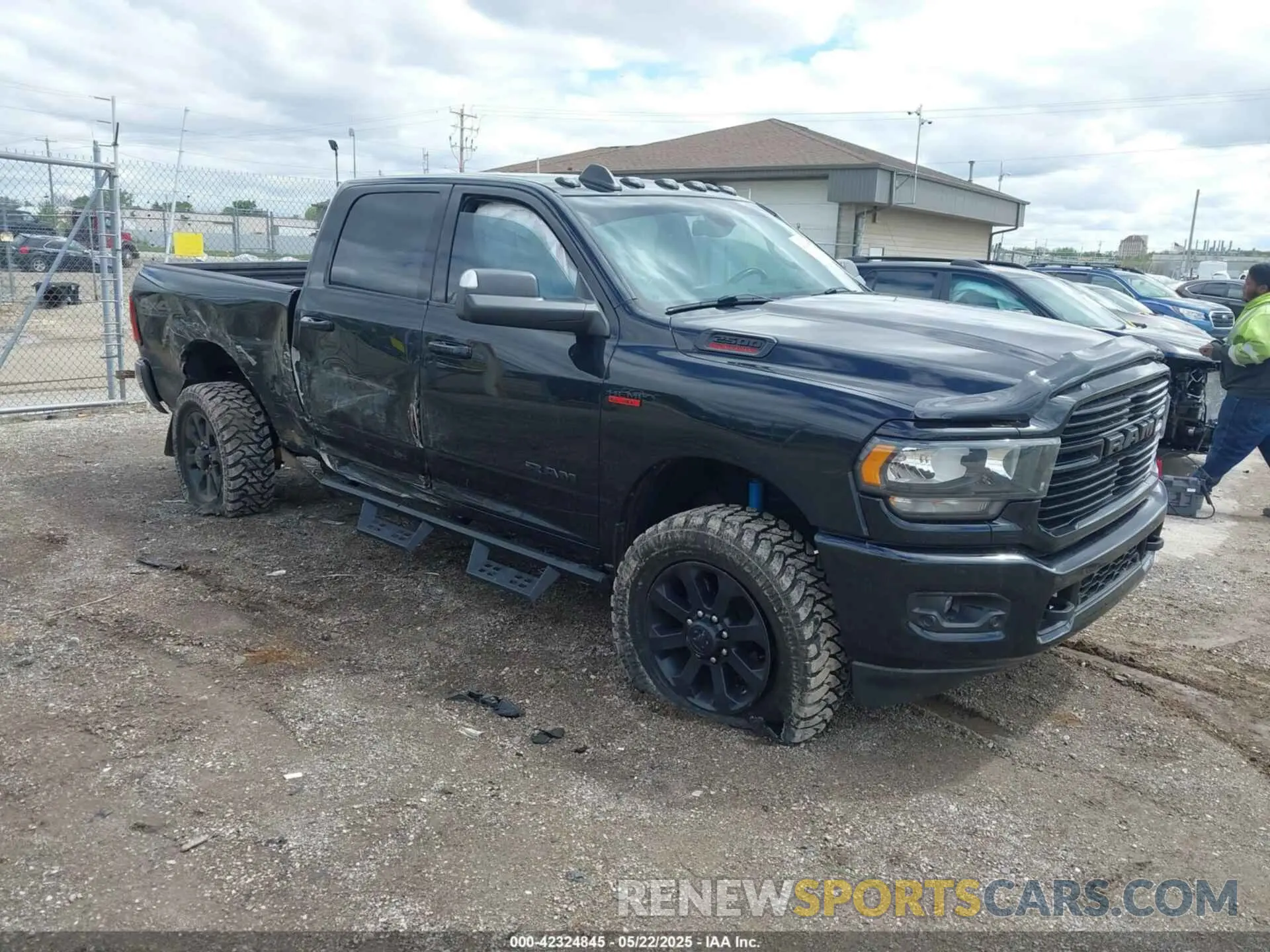 1 Photograph of a damaged car 3C6UR5DJ2MG532804 RAM 2500 2021