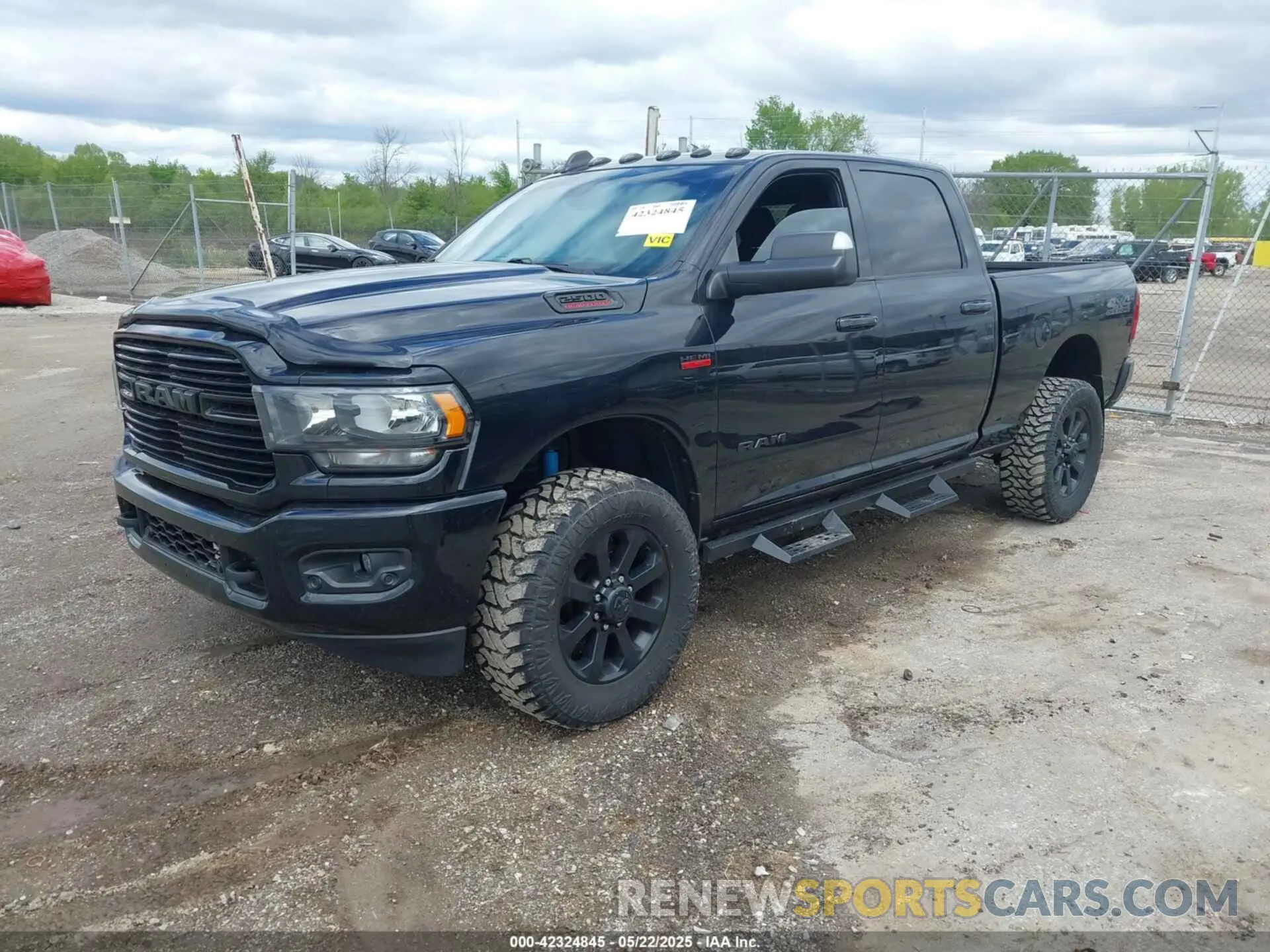 2 Photograph of a damaged car 3C6UR5DJ2MG532804 RAM 2500 2021