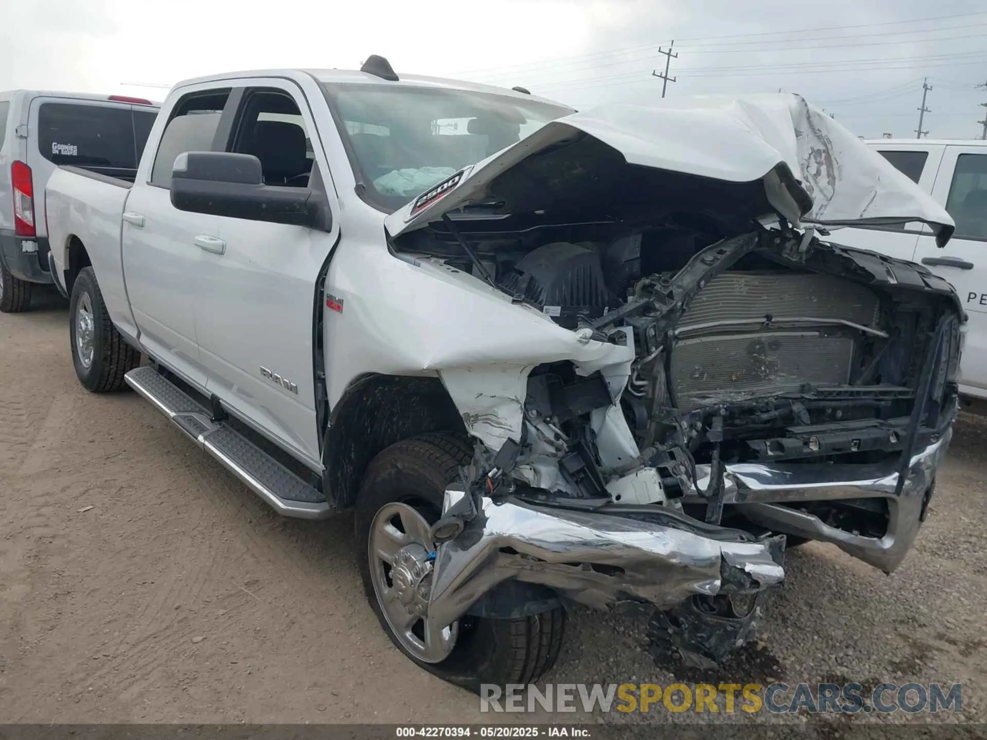 1 Photograph of a damaged car 3C6UR5DJ2MG674585 RAM 2500 2021