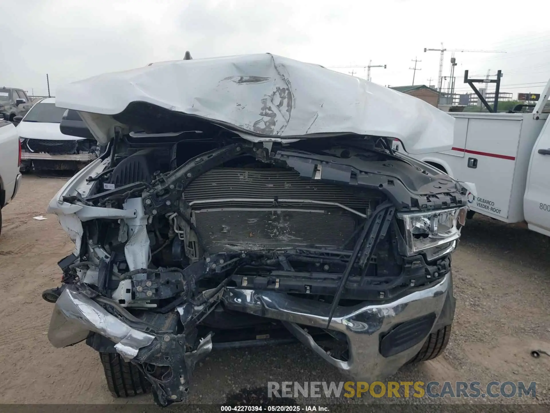 12 Photograph of a damaged car 3C6UR5DJ2MG674585 RAM 2500 2021