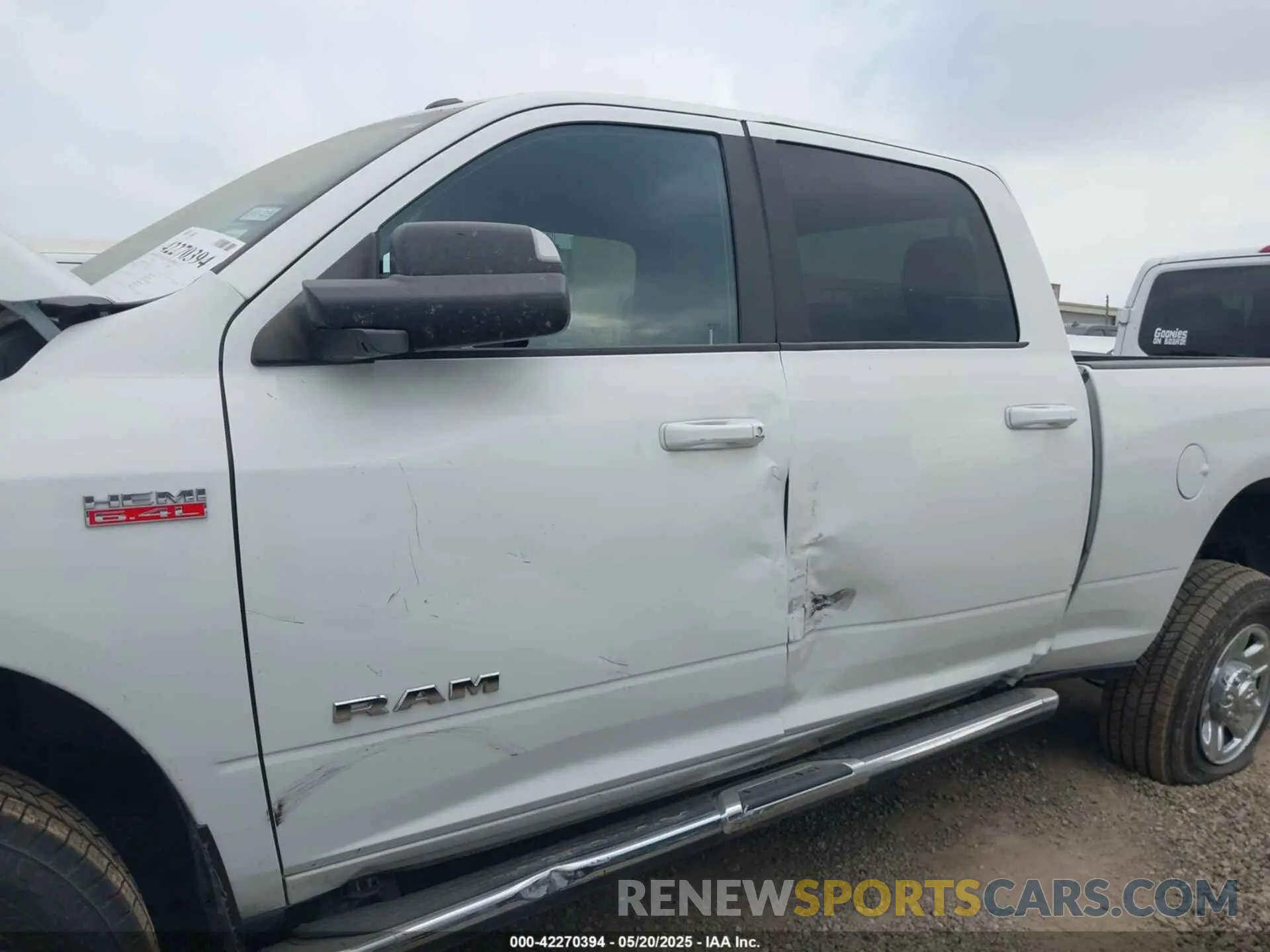 14 Photograph of a damaged car 3C6UR5DJ2MG674585 RAM 2500 2021