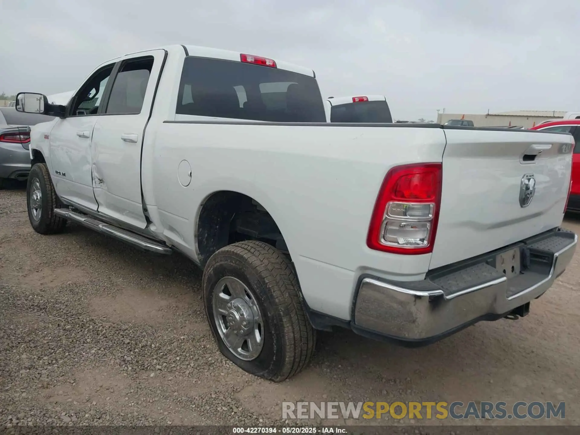 3 Photograph of a damaged car 3C6UR5DJ2MG674585 RAM 2500 2021