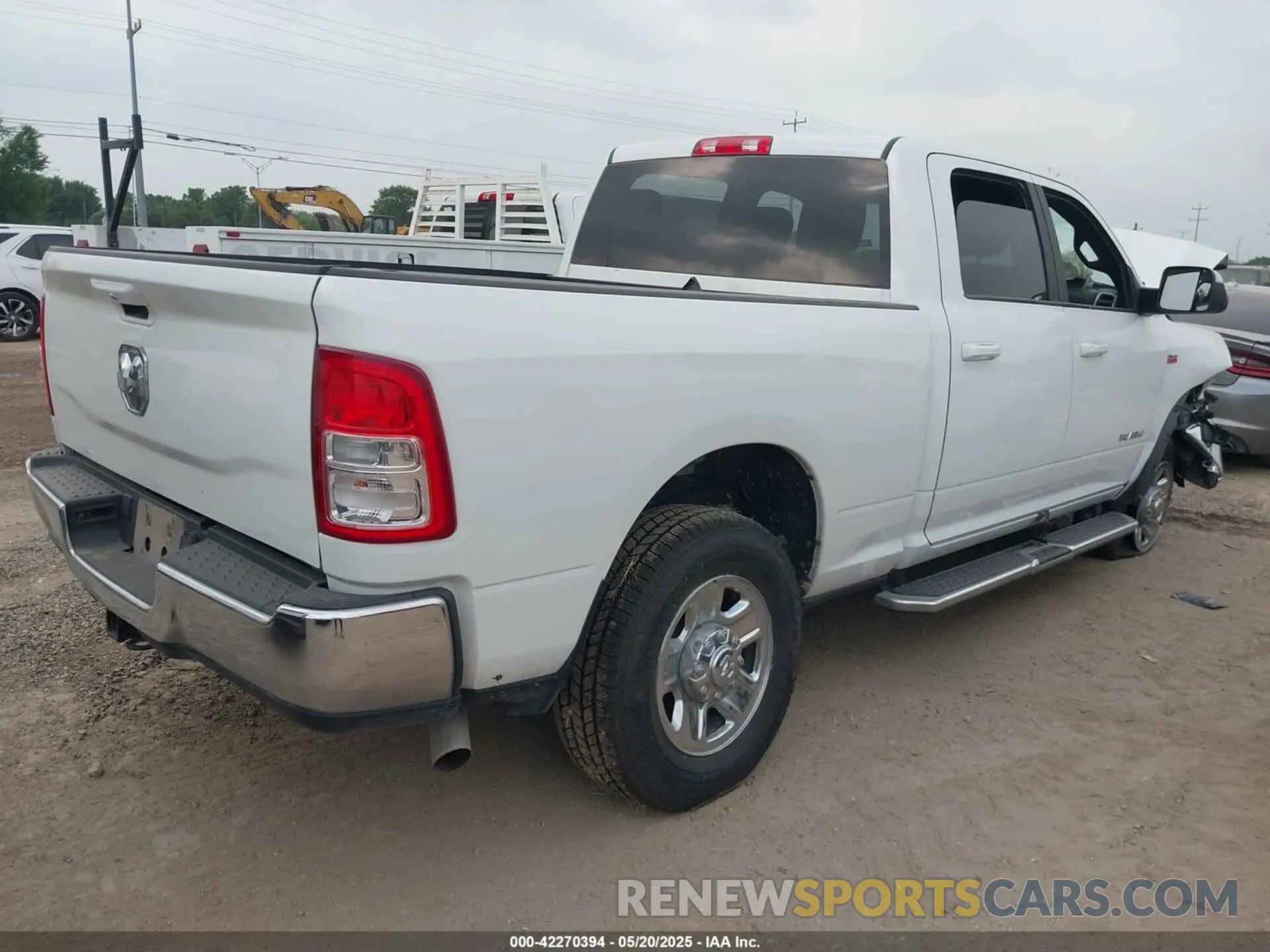 4 Photograph of a damaged car 3C6UR5DJ2MG674585 RAM 2500 2021
