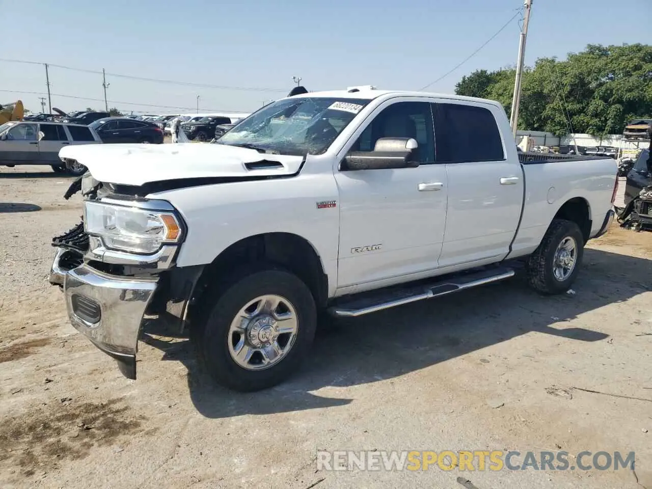 1 Photograph of a damaged car 3C6UR5DJ3MG674384 RAM 2500 2021
