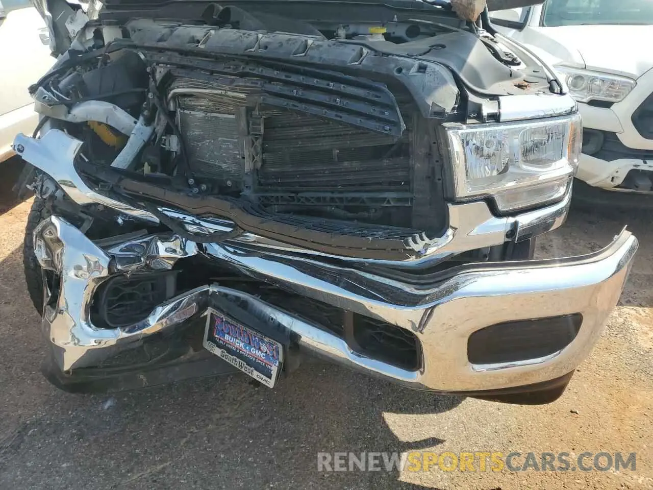 11 Photograph of a damaged car 3C6UR5DJ3MG674384 RAM 2500 2021