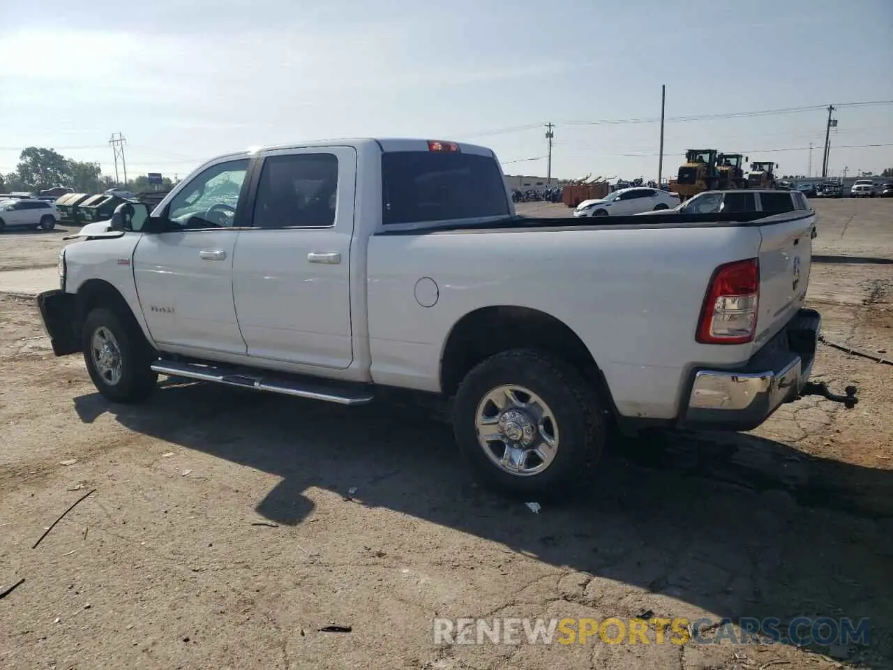 2 Photograph of a damaged car 3C6UR5DJ3MG674384 RAM 2500 2021