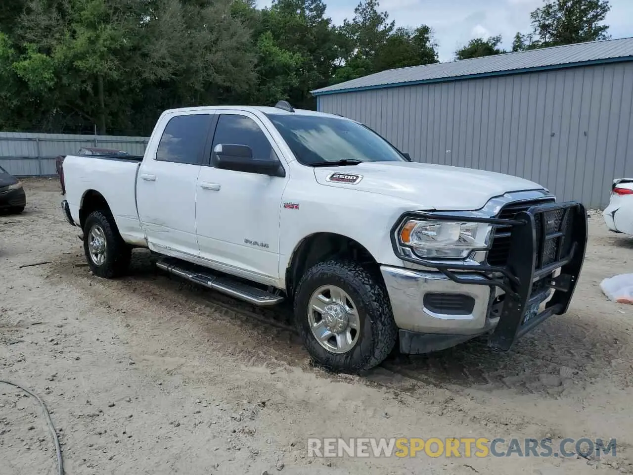 4 Photograph of a damaged car 3C6UR5DJ8MG554578 RAM 2500 2021