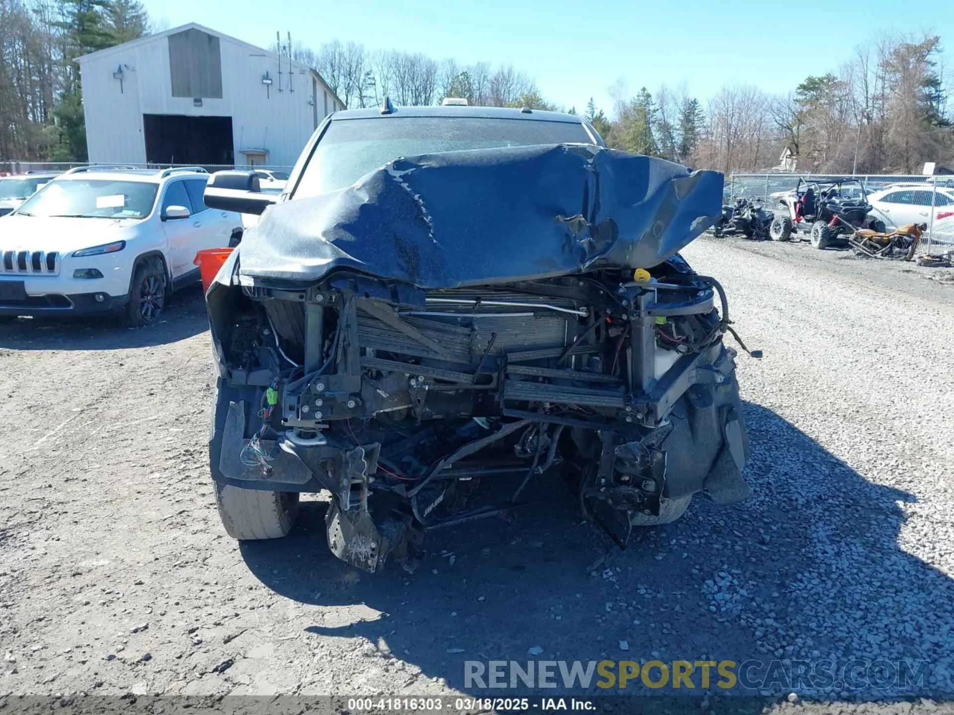 11 Photograph of a damaged car 3C6UR5DJ8MG555486 RAM 2500 2021