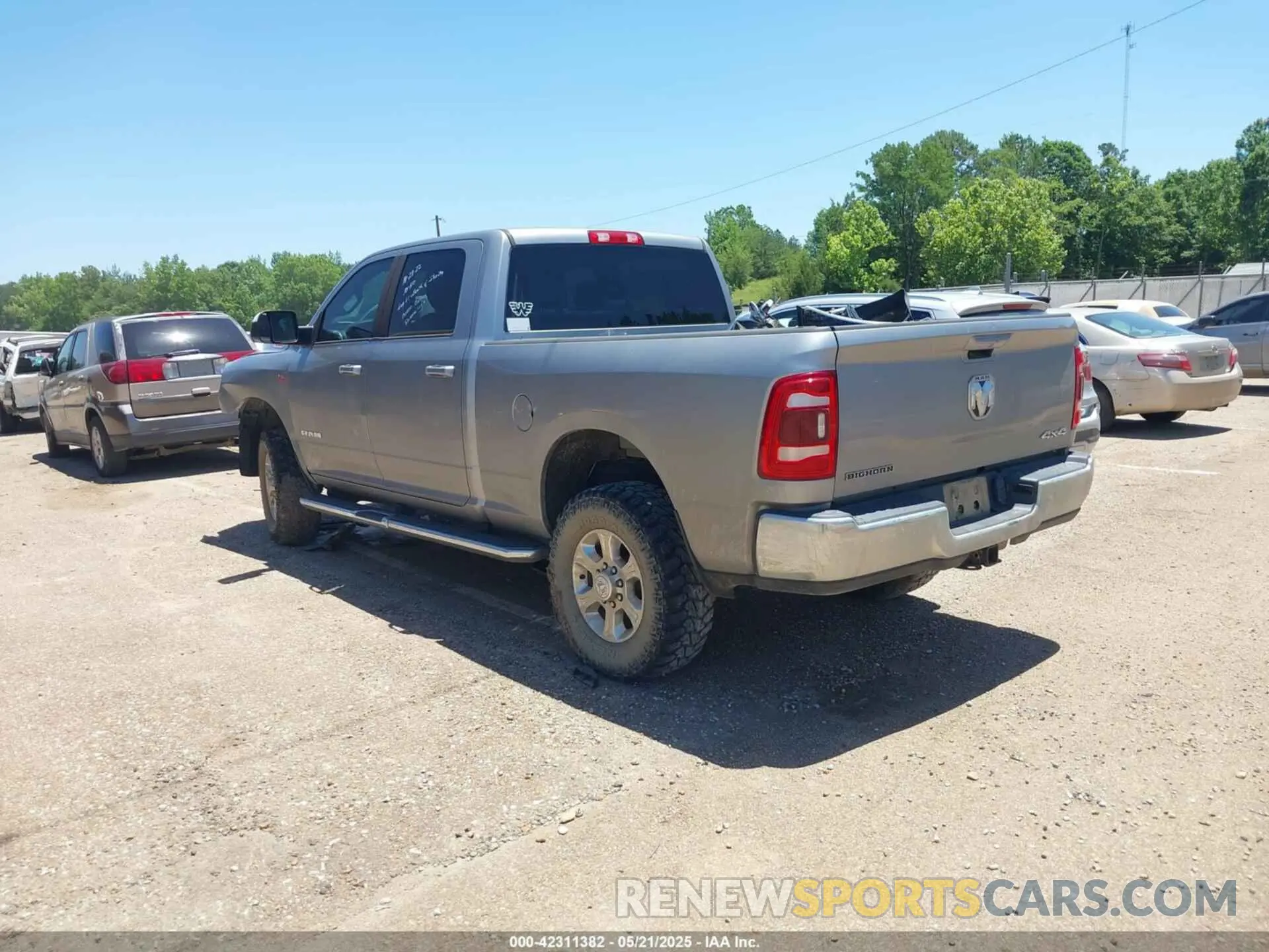 3 Photograph of a damaged car 3C6UR5DJ9MG590554 RAM 2500 2021