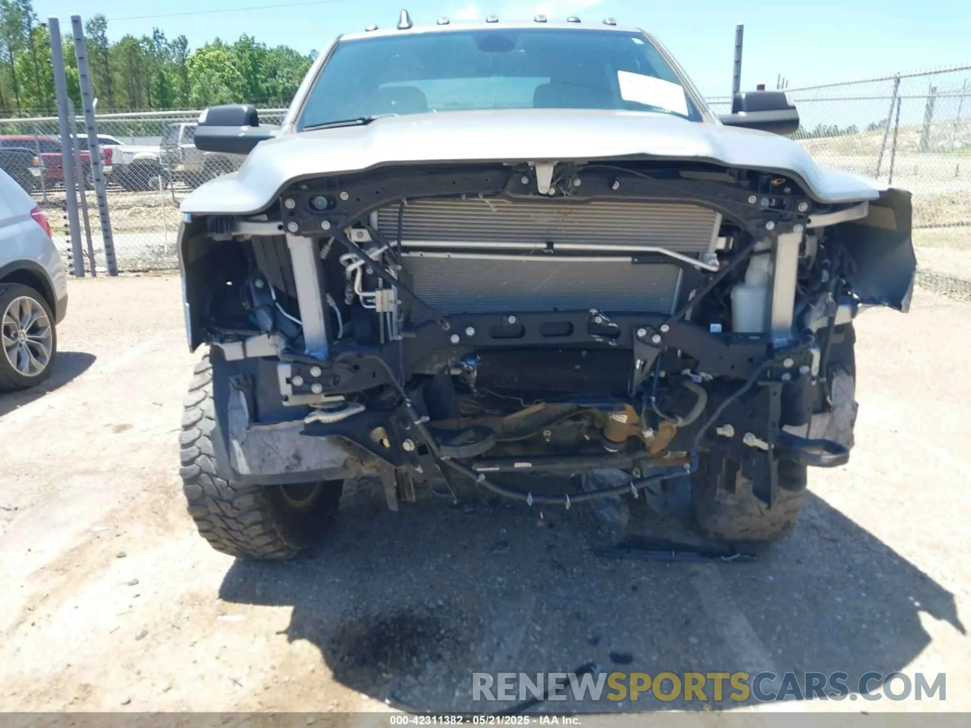6 Photograph of a damaged car 3C6UR5DJ9MG590554 RAM 2500 2021