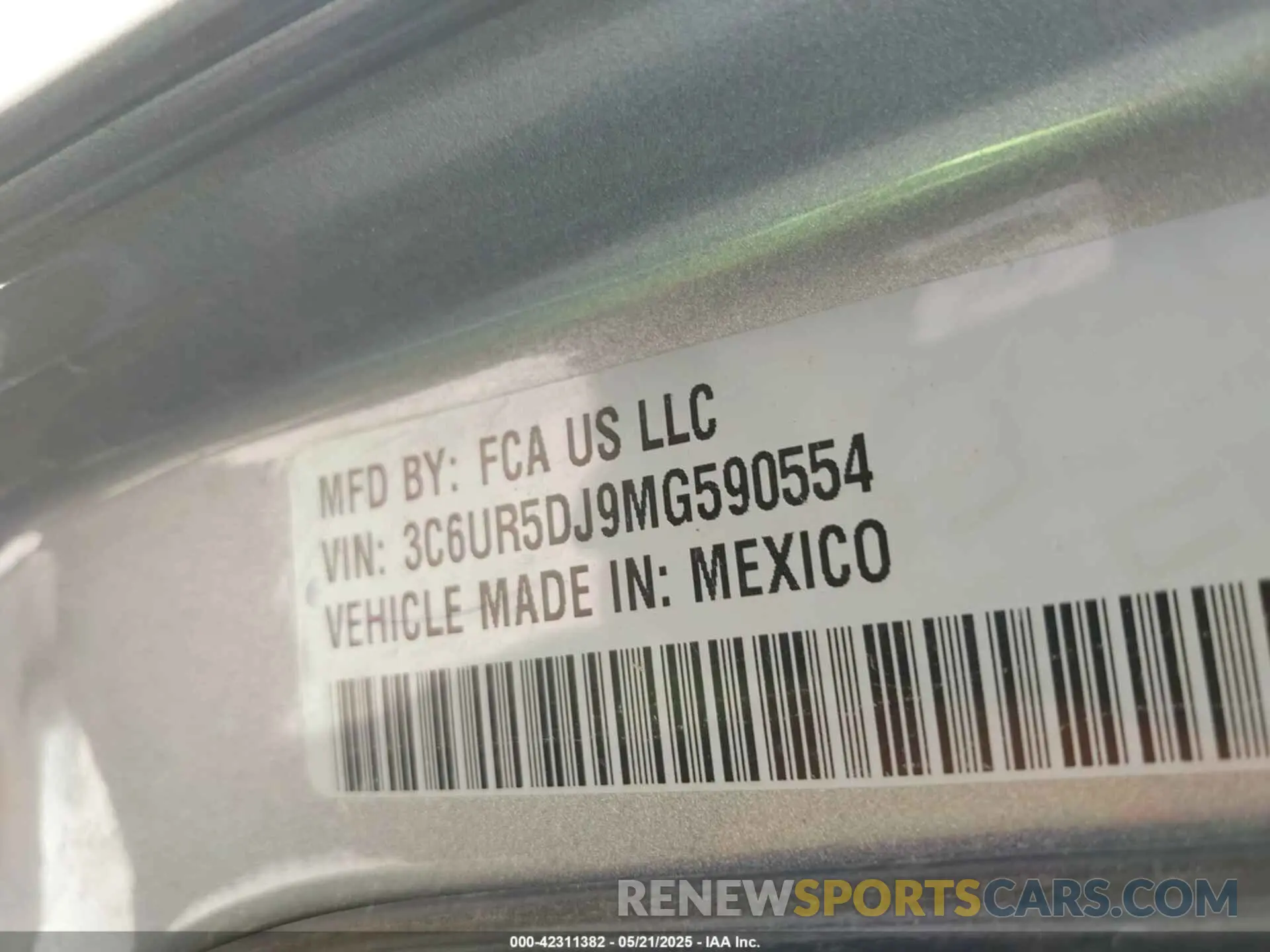9 Photograph of a damaged car 3C6UR5DJ9MG590554 RAM 2500 2021