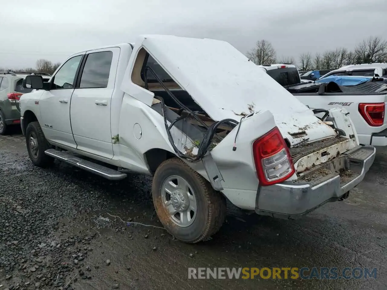 2 Photograph of a damaged car 3C6UR5DJ9MG627943 RAM 2500 2021
