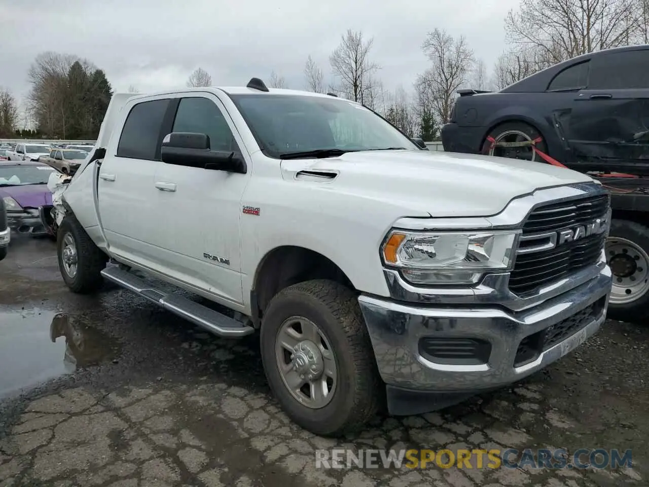 4 Photograph of a damaged car 3C6UR5DJ9MG627943 RAM 2500 2021