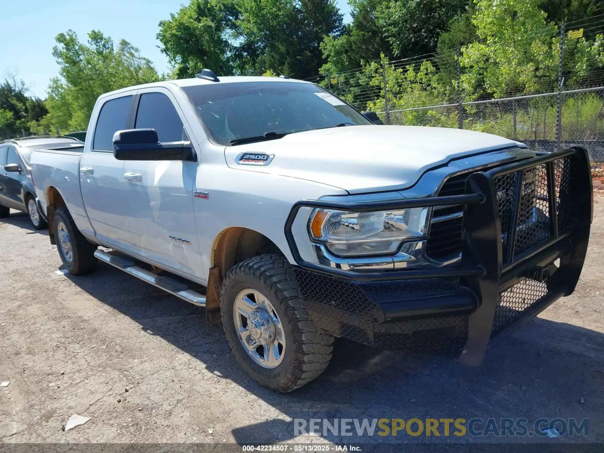 1 Photograph of a damaged car 3C6UR5DJ9MG656715 RAM 2500 2021