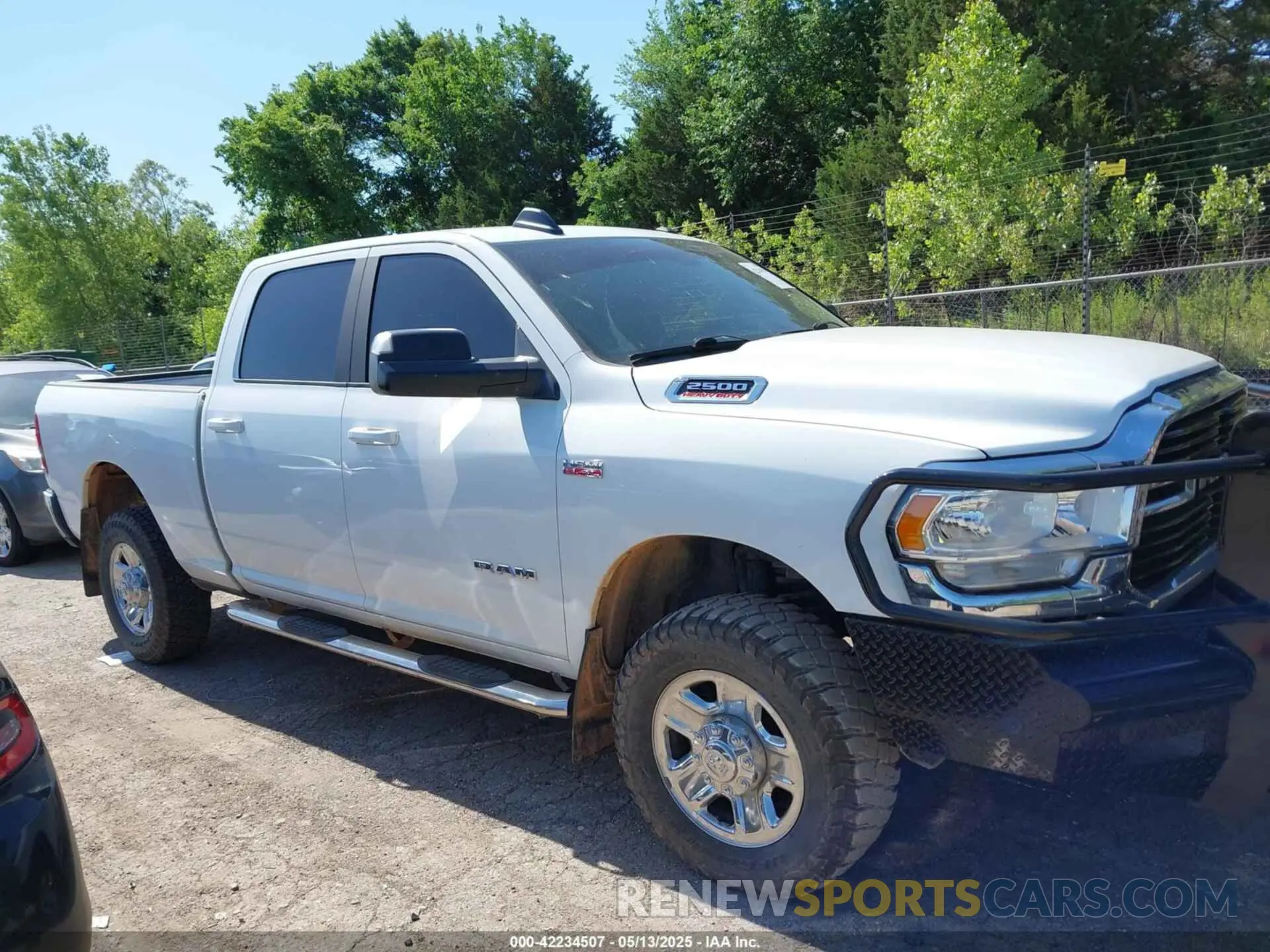13 Photograph of a damaged car 3C6UR5DJ9MG656715 RAM 2500 2021