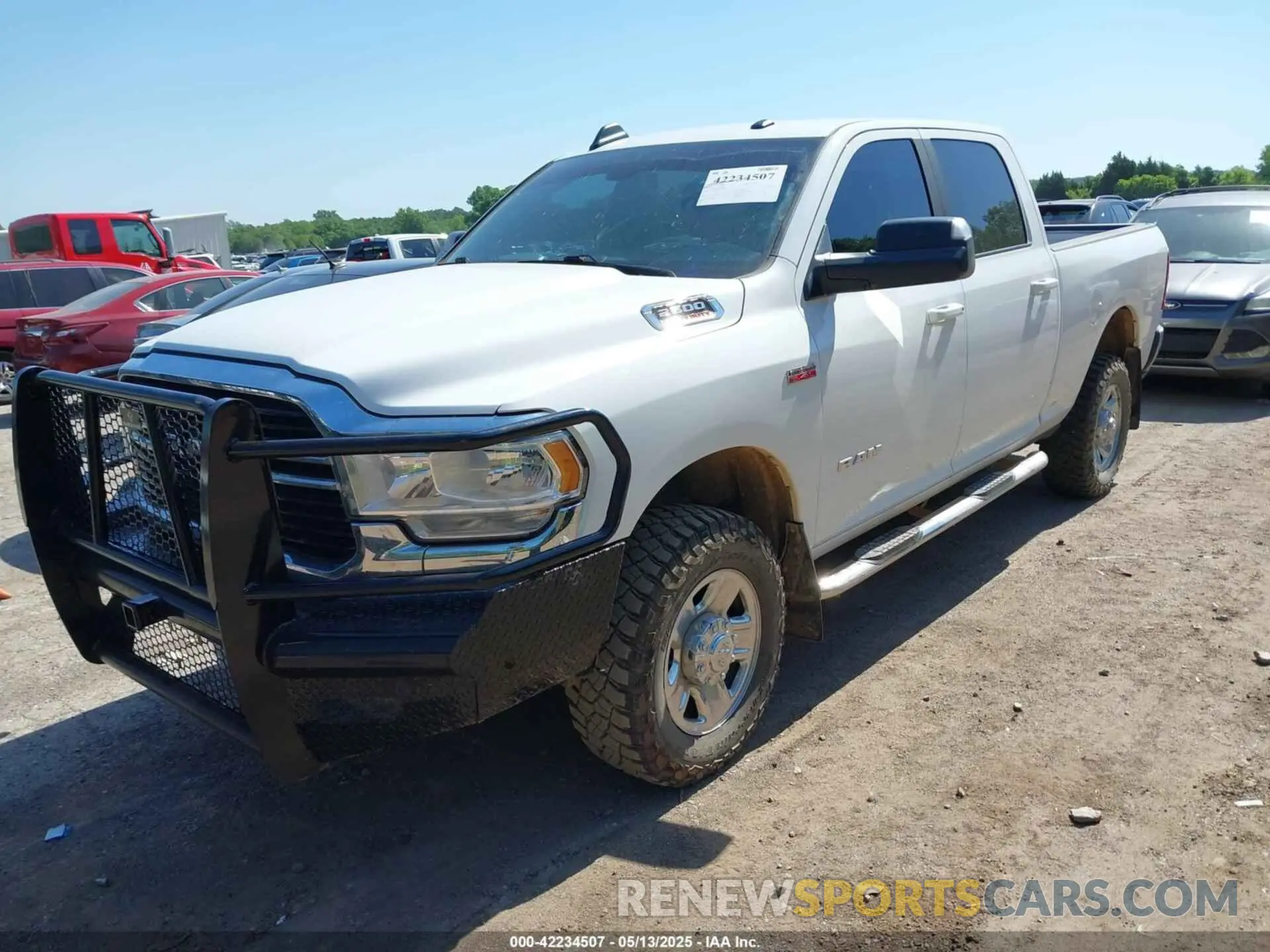 2 Photograph of a damaged car 3C6UR5DJ9MG656715 RAM 2500 2021