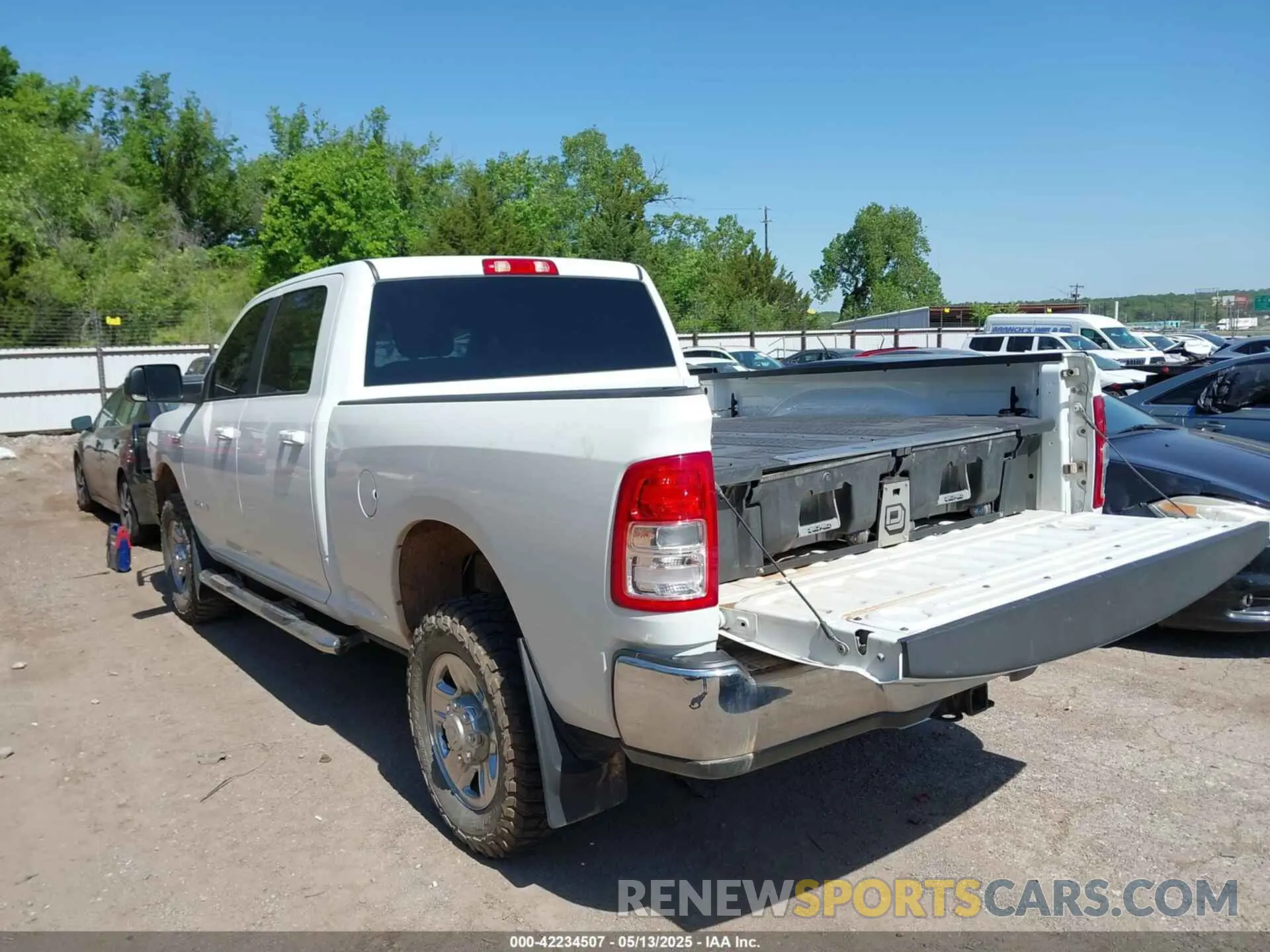 3 Photograph of a damaged car 3C6UR5DJ9MG656715 RAM 2500 2021