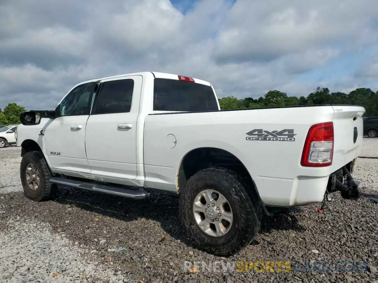 2 Photograph of a damaged car 3C6UR5DL0MG656149 RAM 2500 2021