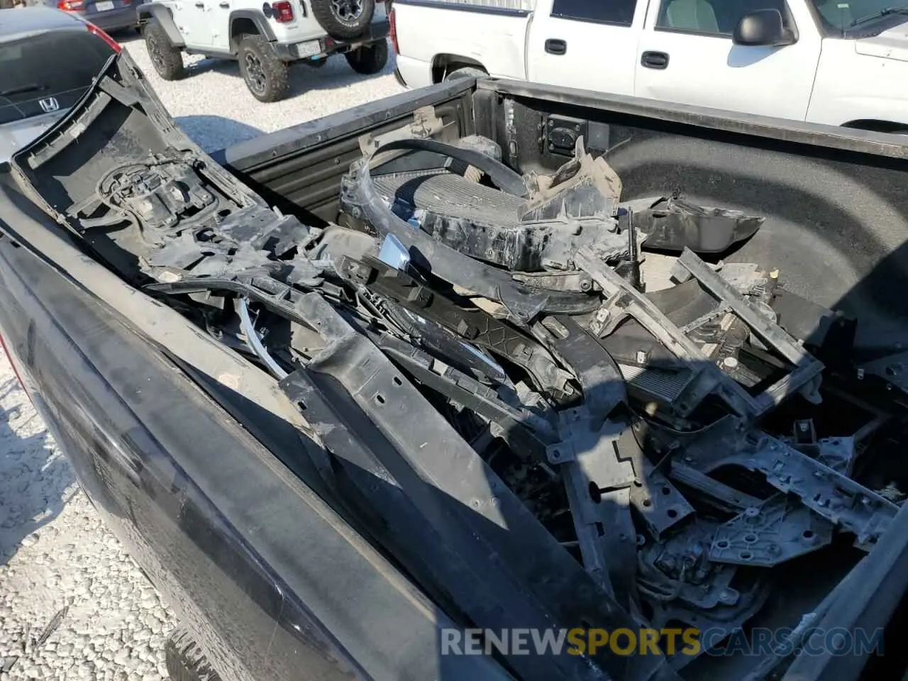 12 Photograph of a damaged car 3C6UR5DL1MG516451 RAM 2500 2021