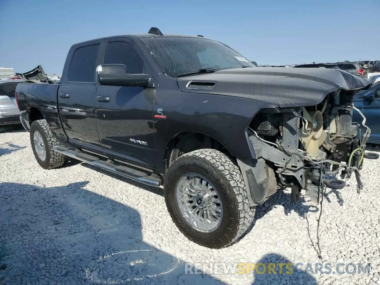 4 Photograph of a damaged car 3C6UR5DL1MG516451 RAM 2500 2021