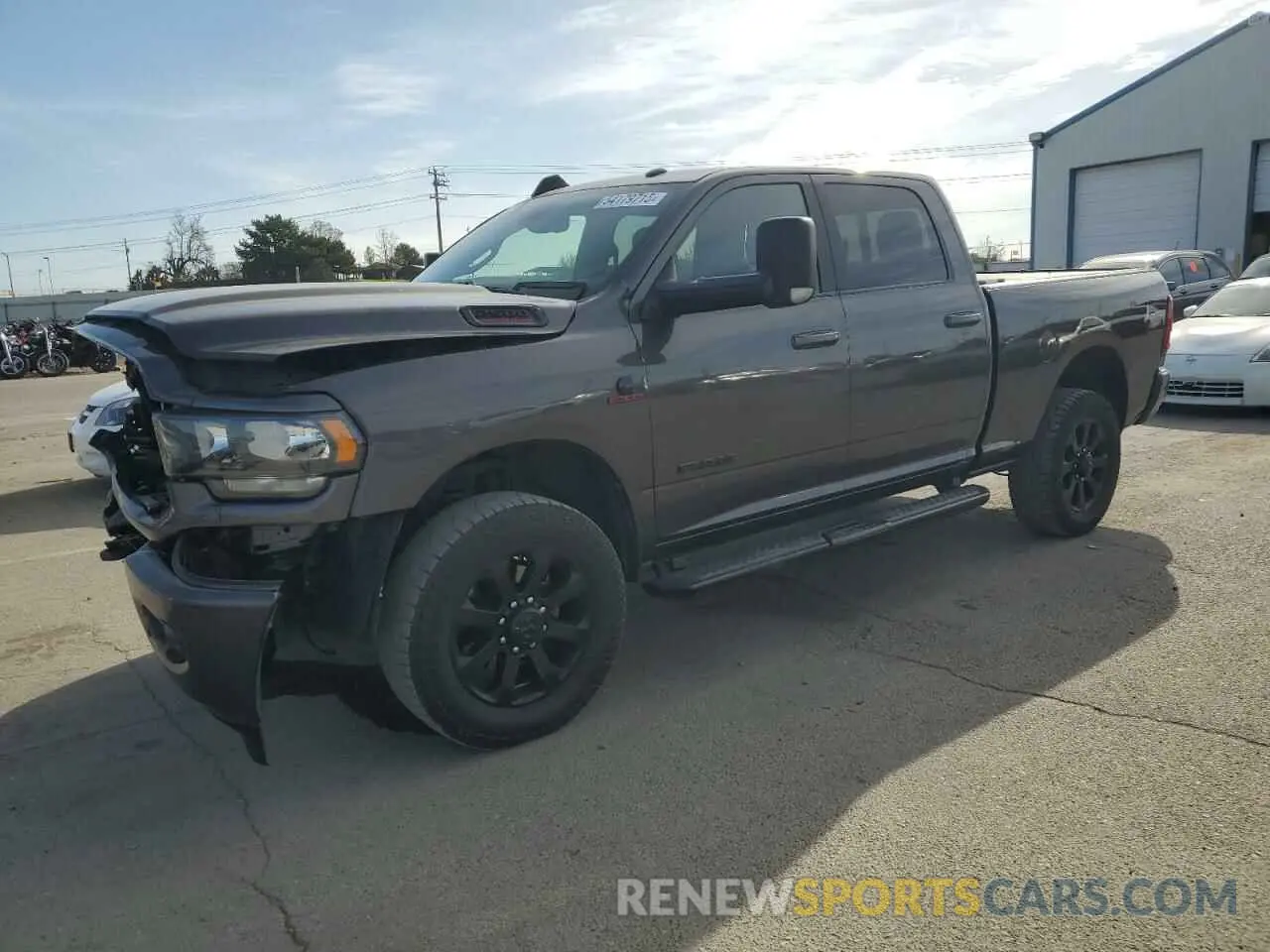 1 Photograph of a damaged car 3C6UR5DL2MG678654 RAM 2500 2021