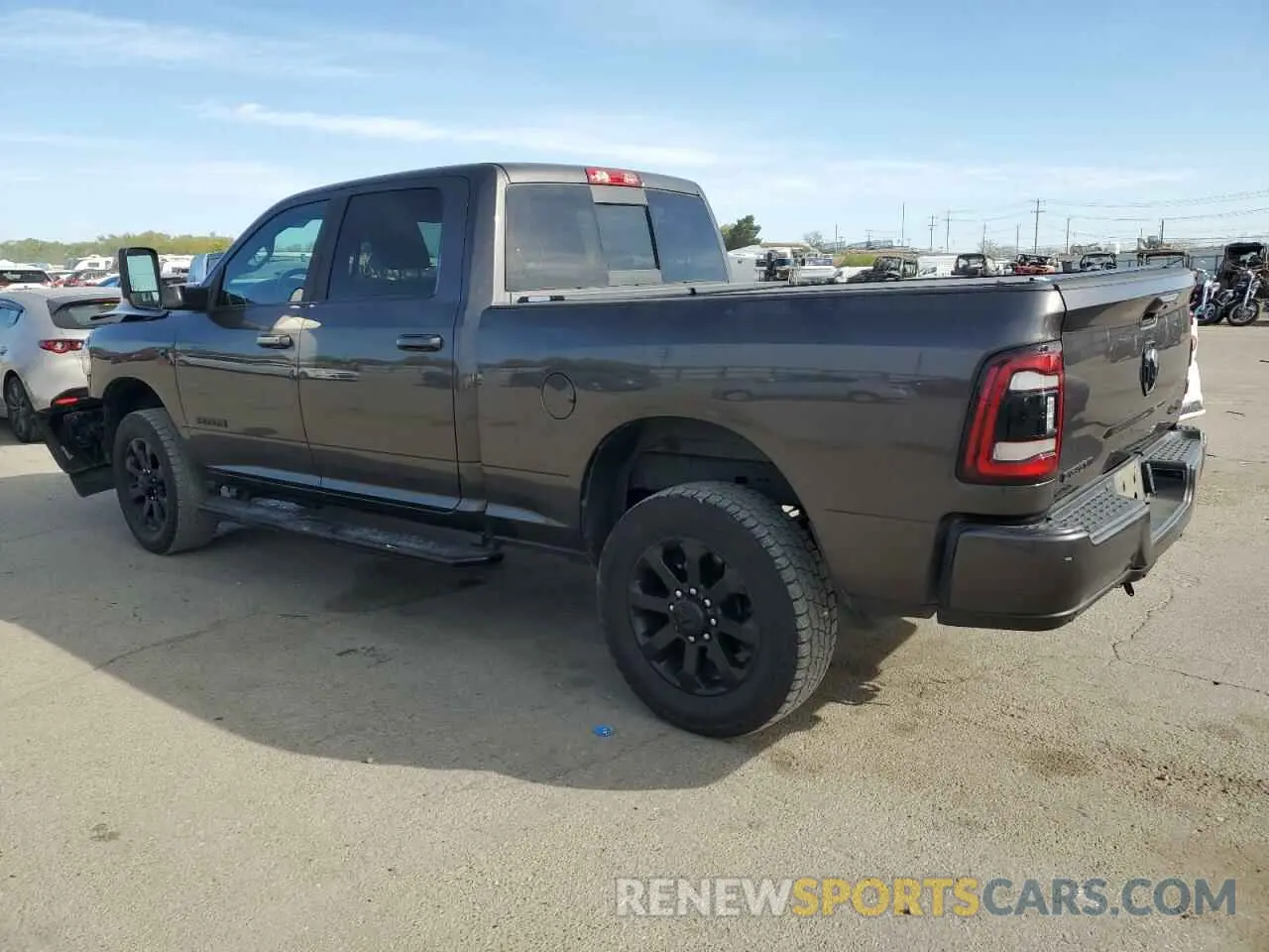2 Photograph of a damaged car 3C6UR5DL2MG678654 RAM 2500 2021