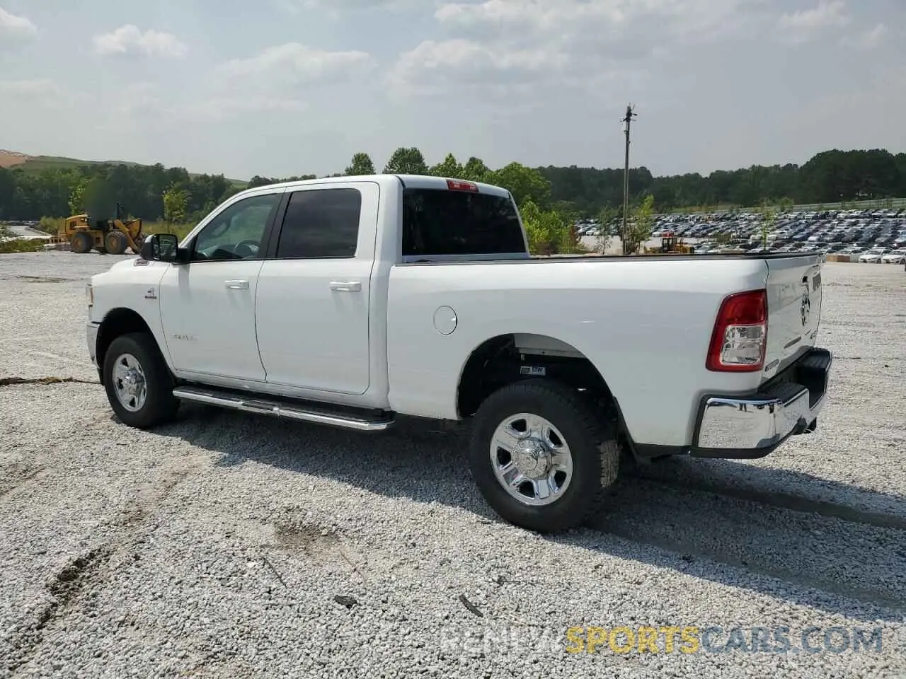 2 Photograph of a damaged car 3C6UR5DL3MG628653 RAM 2500 2021
