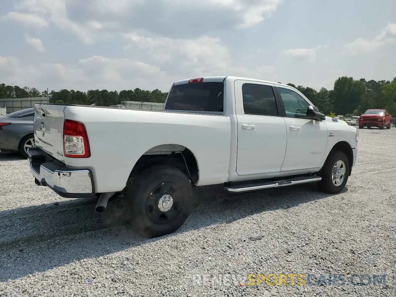 3 Photograph of a damaged car 3C6UR5DL3MG628653 RAM 2500 2021