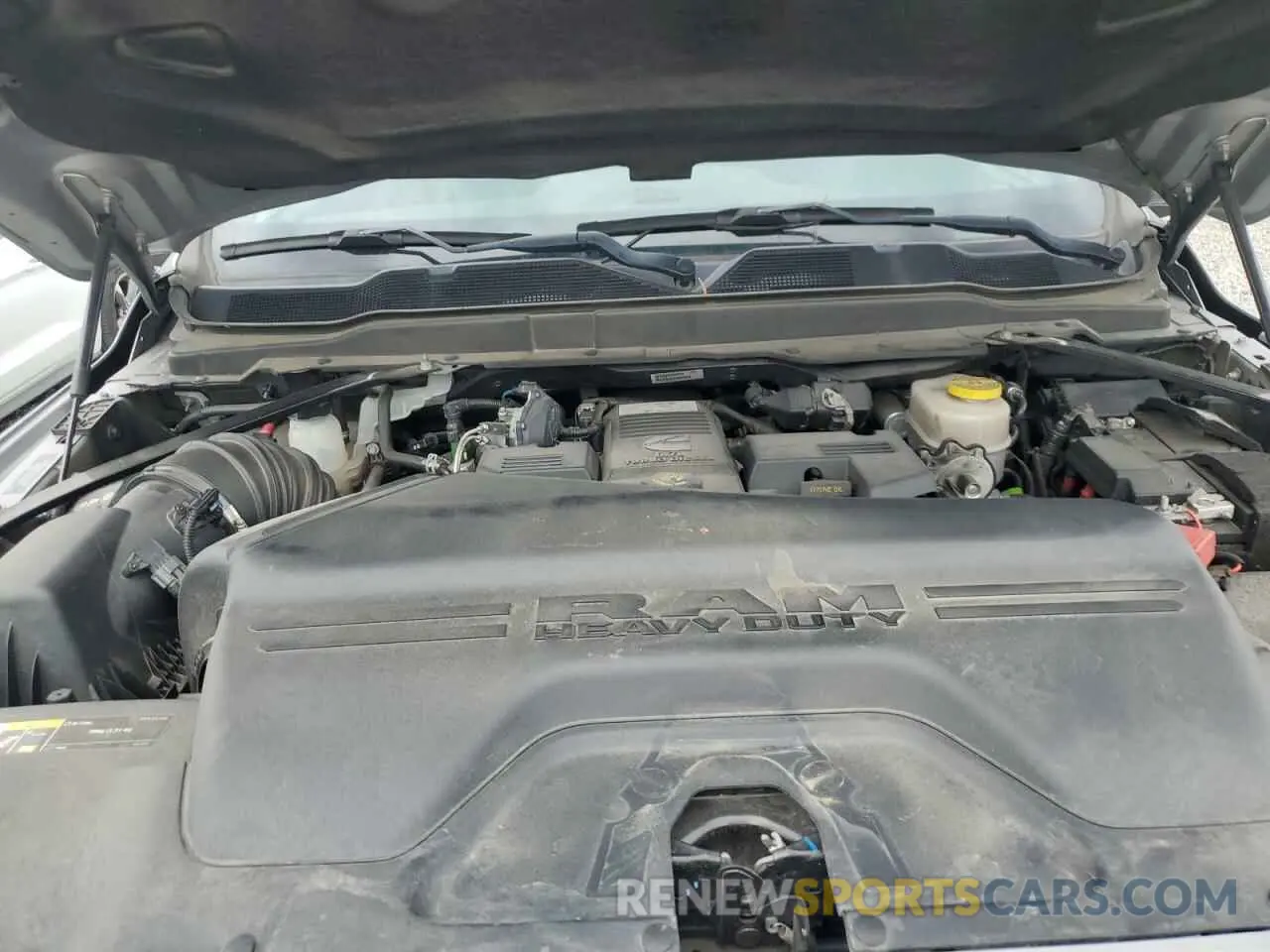 11 Photograph of a damaged car 3C6UR5DL3MG658395 RAM 2500 2021