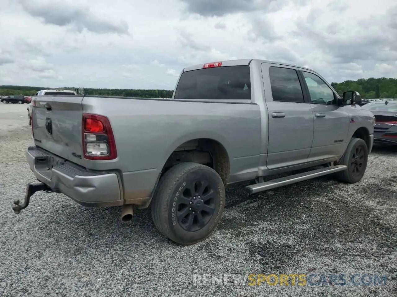 3 Photograph of a damaged car 3C6UR5DL3MG658395 RAM 2500 2021