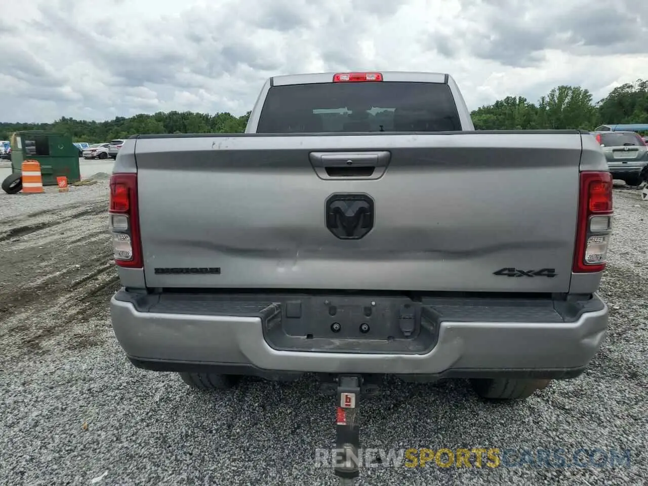6 Photograph of a damaged car 3C6UR5DL3MG658395 RAM 2500 2021